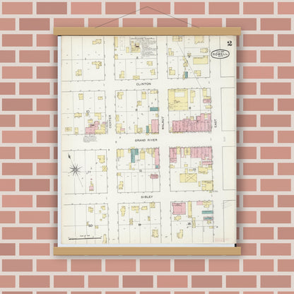 Old map wall art mockup — magnetic wood frame on brick wall — Sanborn Fire Insurance Map from Howell, Livingston County, Michigan (1892), Sheet #0002