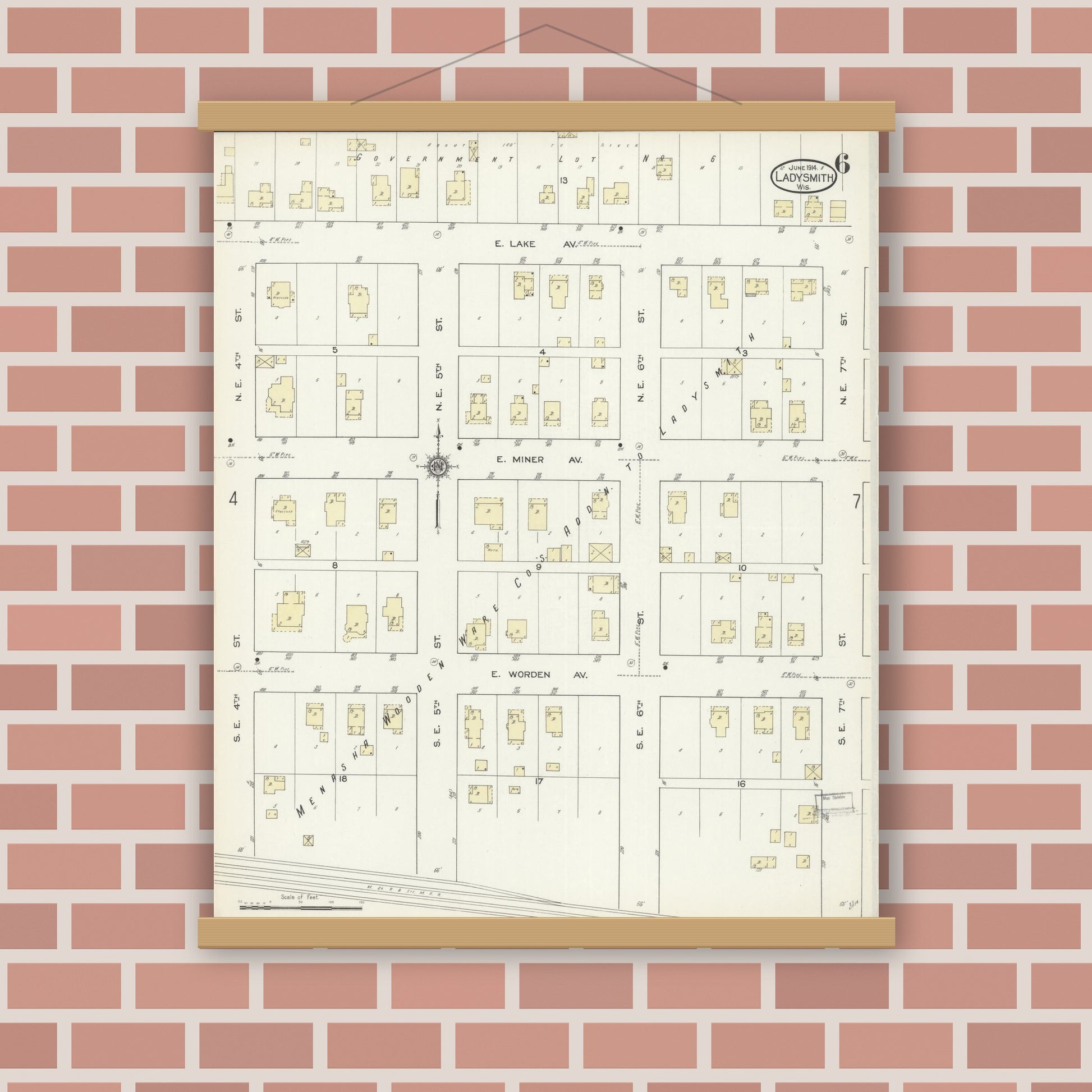 Old map wall art mockup — magnetic wood frame on brick wall — Sanborn Fire Insurance Map from Ladysmith, Rusk County, Wisconsin (1914), Sheet #0006