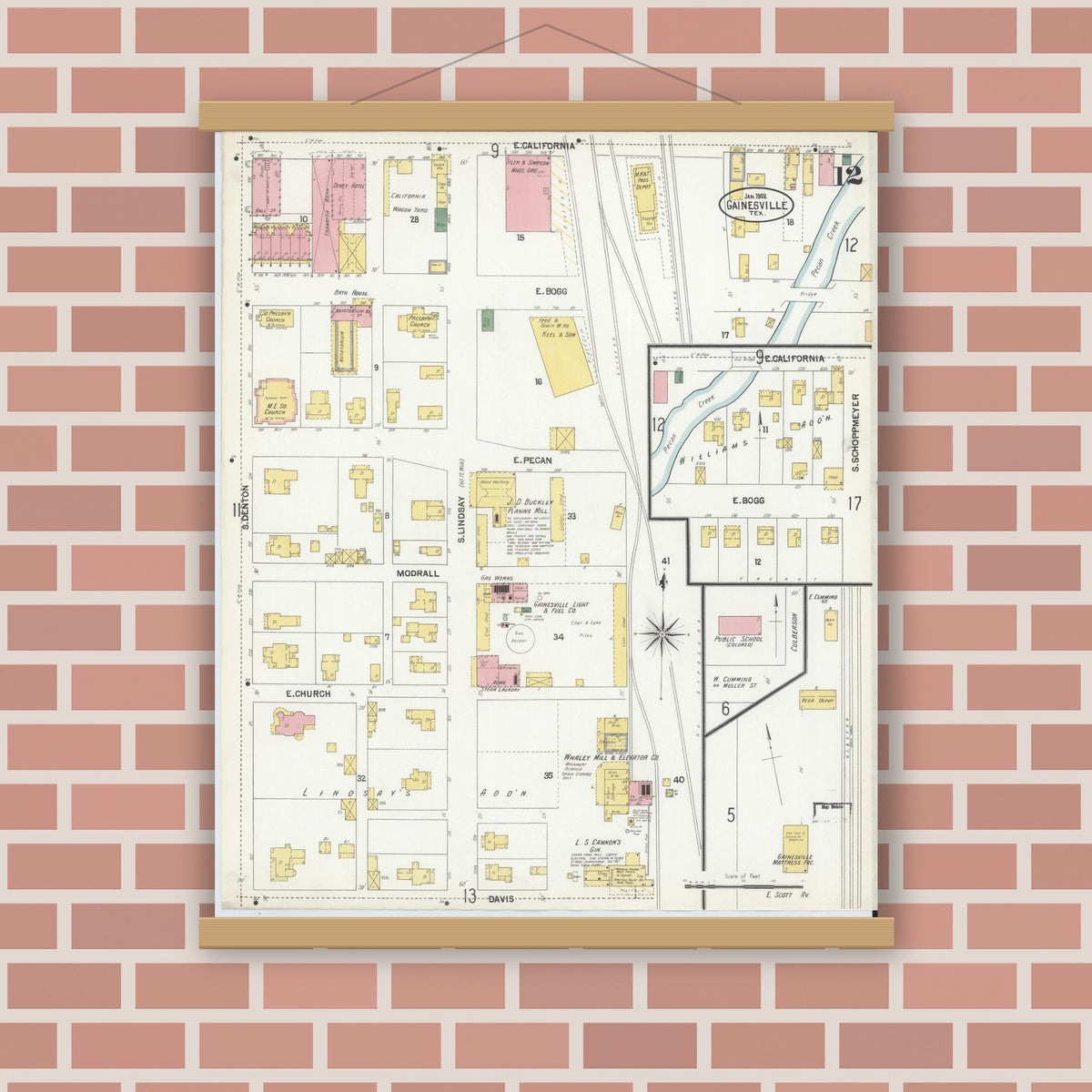 Old map wall art mockup — magnetic wood frame on brick wall — Sanborn Fire Insurance Map from Gainesville, Cooke County, Texas (1902), Sheet #0012
