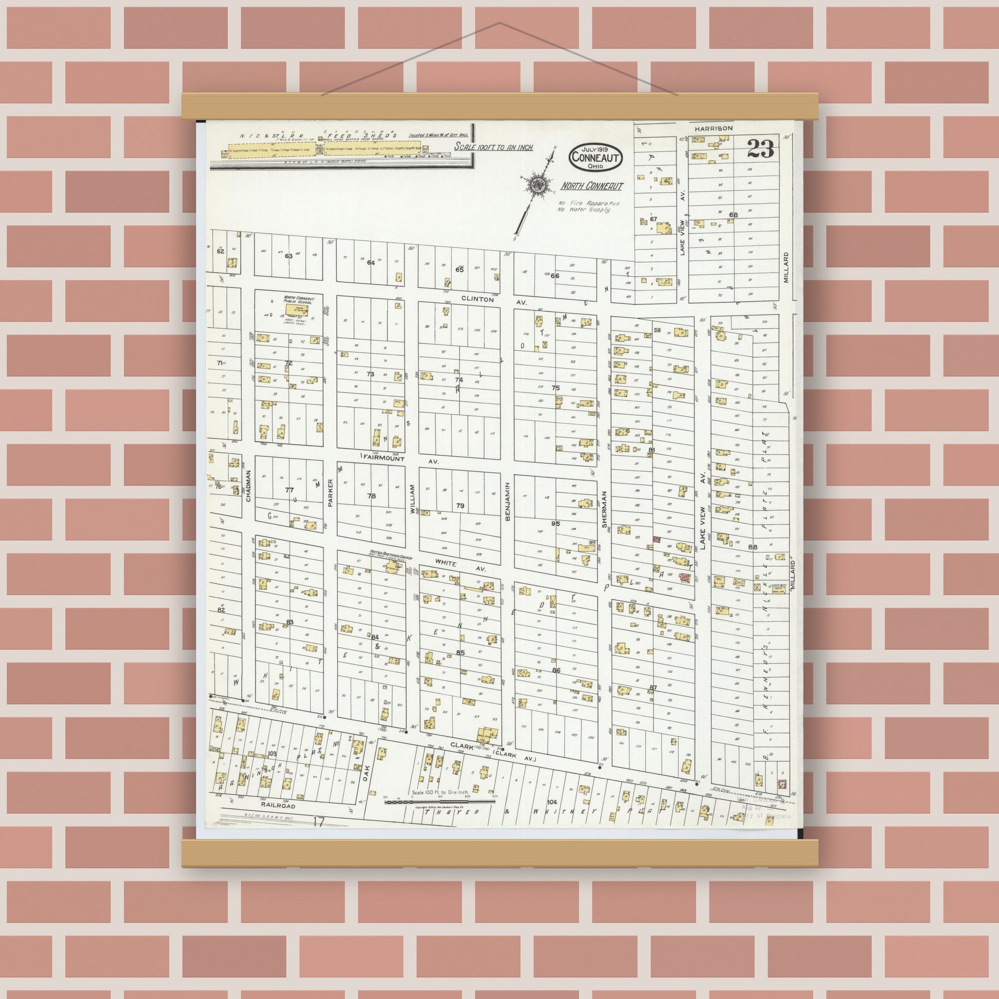 Old map wall art mockup — magnetic wood frame on brick wall — Sanborn Fire Insurance Map from Conneaut, Ashtabula County, Ohio (1919), Sheet #0023