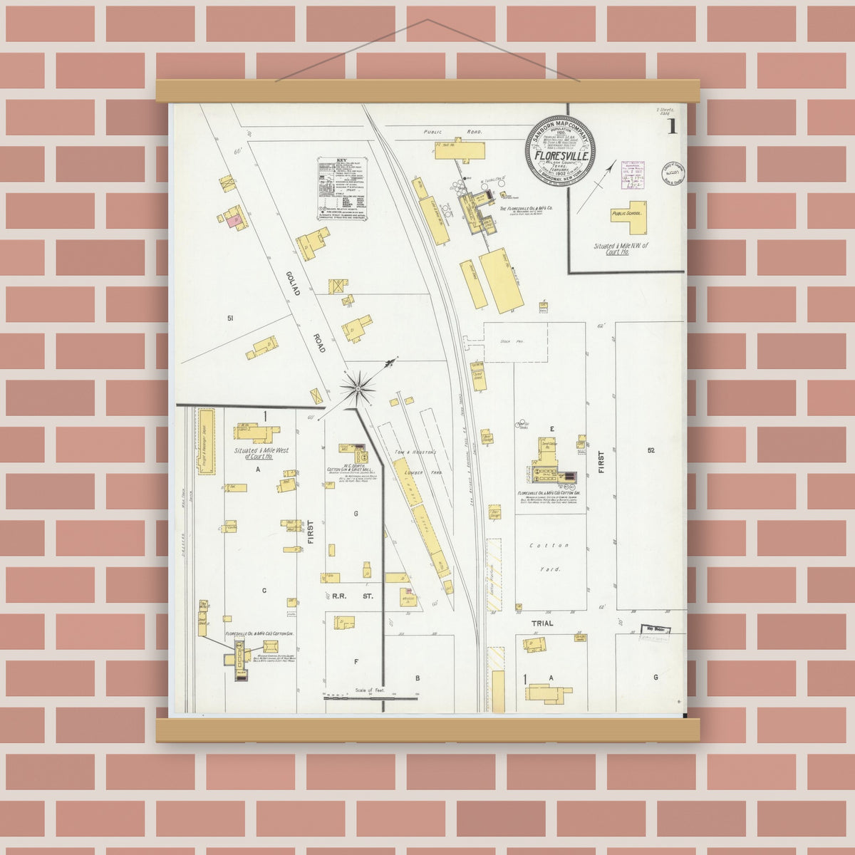 Old map wall art mockup — magnetic wood frame on brick wall — Sanborn Fire Insurance Map from Floresville, Wilson County, Texas (1902), Sheet #0001