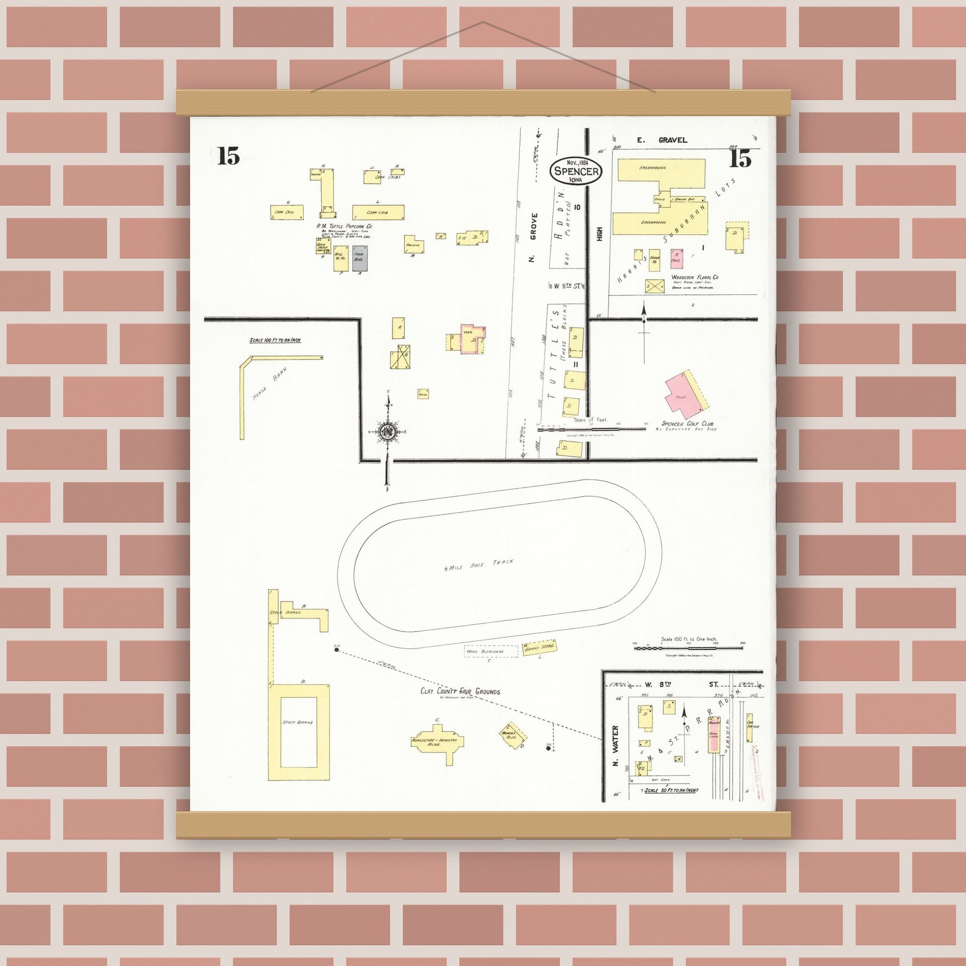 Old map wall art mockup — magnetic wood frame on brick wall — Sanborn Fire Insurance Map from Spencer, Clay County, Iowa (1924), Sheet #0015
