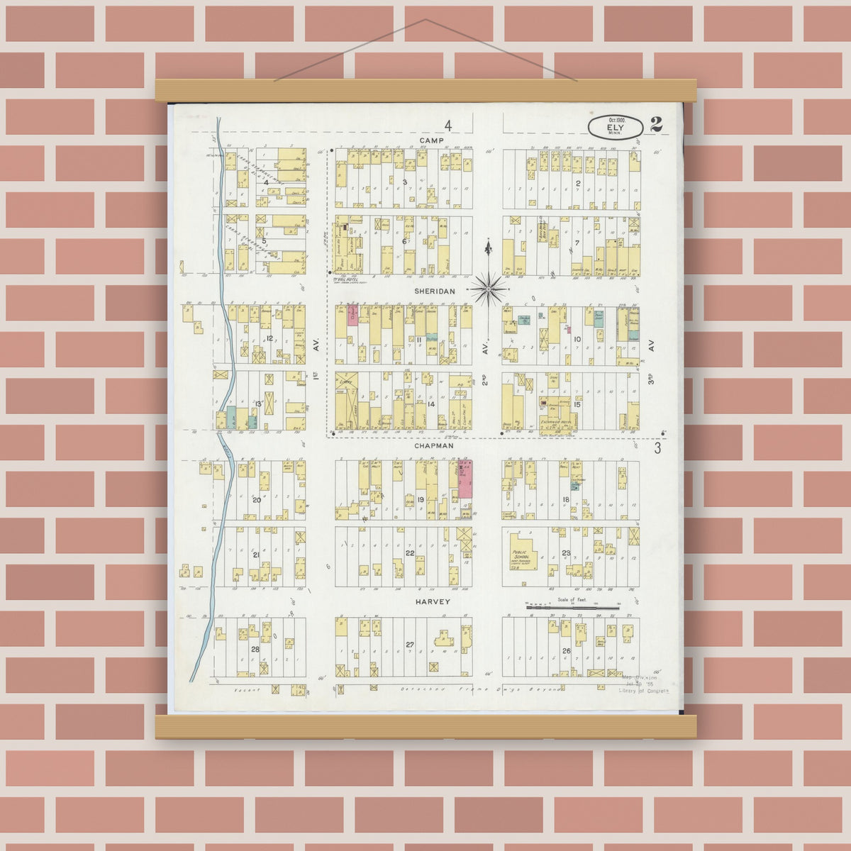 Old map wall art mockup — magnetic wood frame on brick wall — Sanborn Fire Insurance Map from Ely, Saint Louis County, Minnesota (1900), Sheet #0002