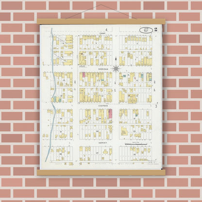 Old map wall art mockup — magnetic wood frame on brick wall — Sanborn Fire Insurance Map from Ely, Saint Louis County, Minnesota (1900), Sheet #0002
