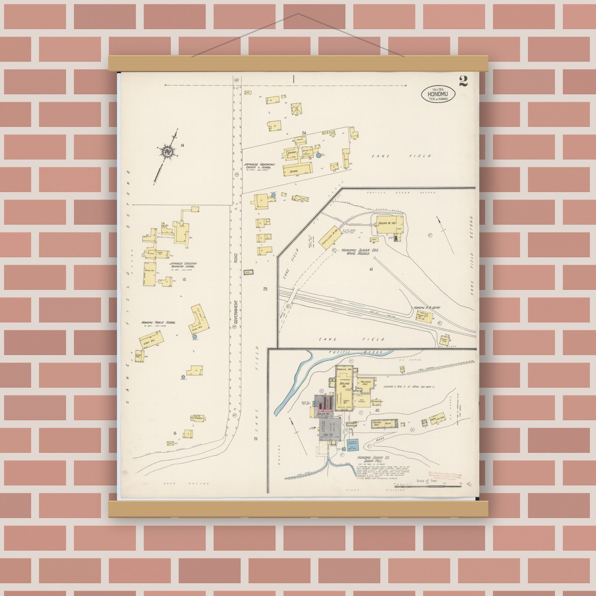 Old map wall art mockup — magnetic wood frame on brick wall — Sanborn Fire Insurance Map from Honomu, Hawaii County, Hawaii (1914), Sheet #0002