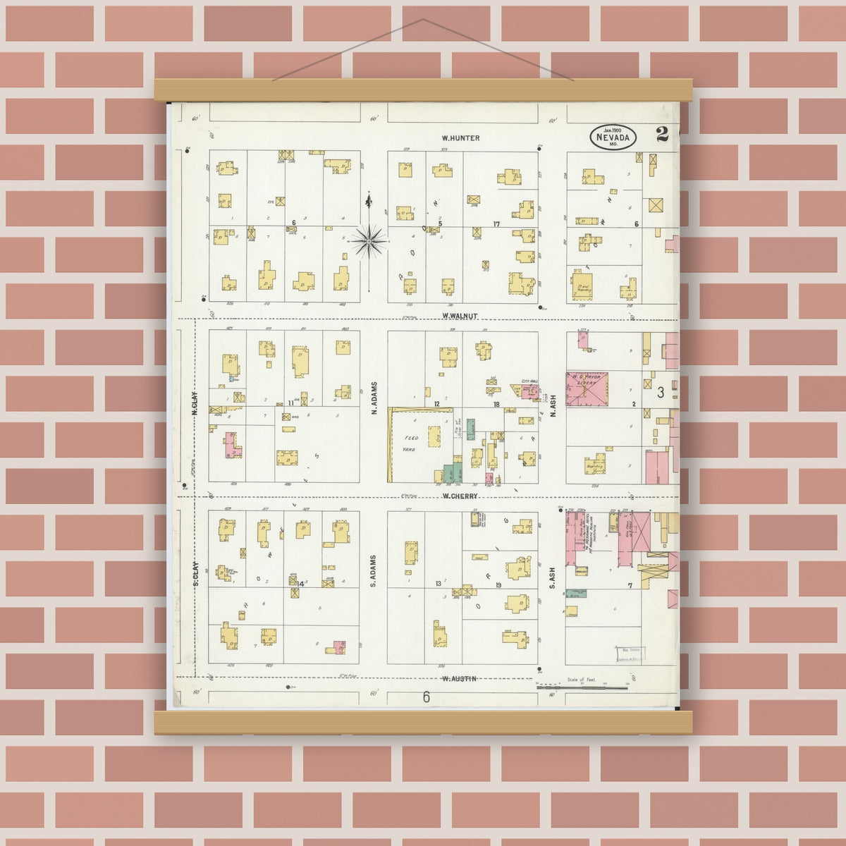 Old map wall art mockup — magnetic wood frame on brick wall — Sanborn Fire Insurance Map from Nevada, Vernon County, Missouri (1900), Sheet #0002