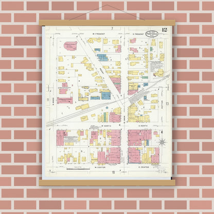Old map wall art mockup — magnetic wood frame on brick wall — Sanborn Fire Insurance Map from Fostoria, Seneca, Hancock, And Wood Counties, Ohio (1908), Sheet #0012