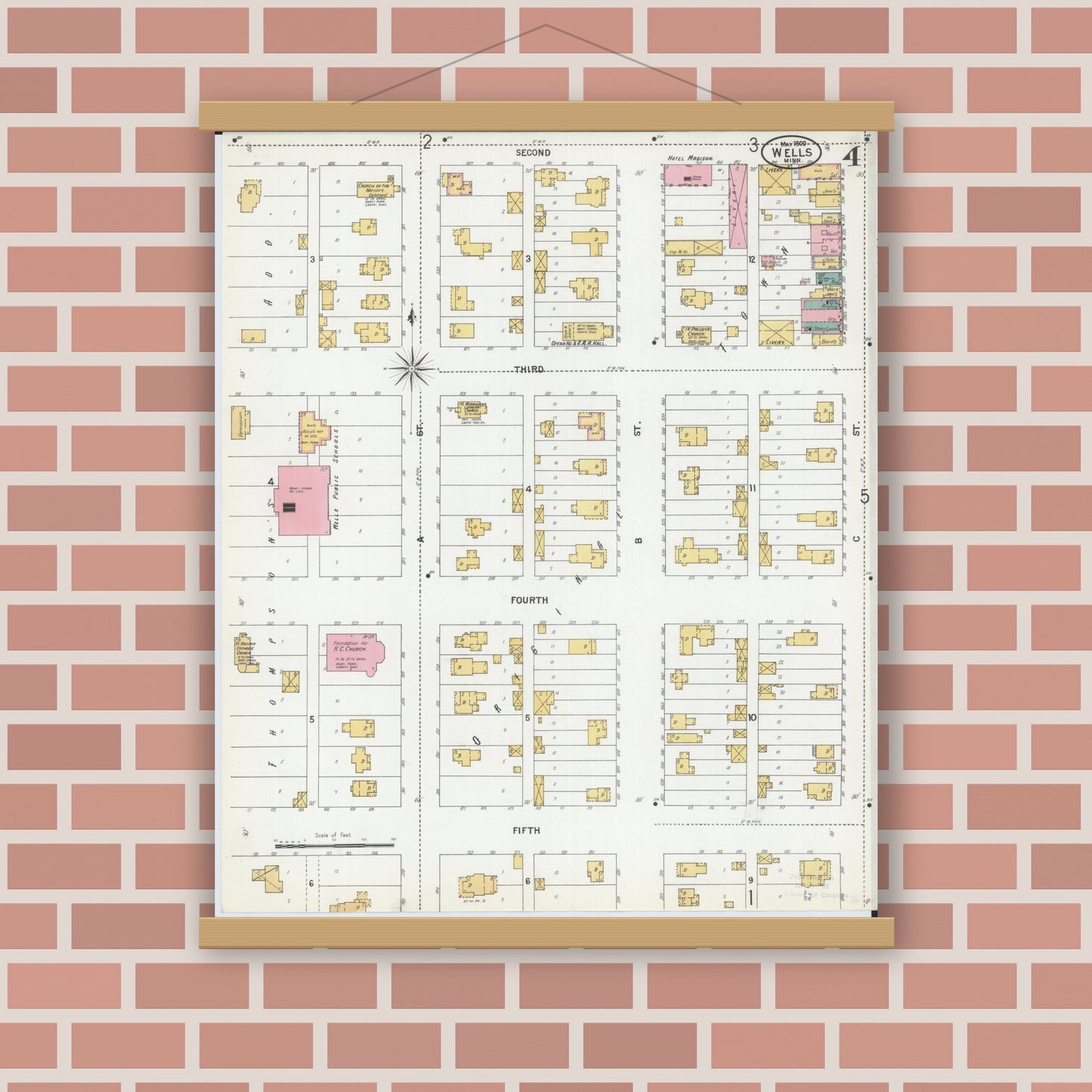 Old map wall art mockup — magnetic wood frame on brick wall — Sanborn Fire Insurance Map from Wells, Faribault County, Minnesota (1900), Sheet #0004