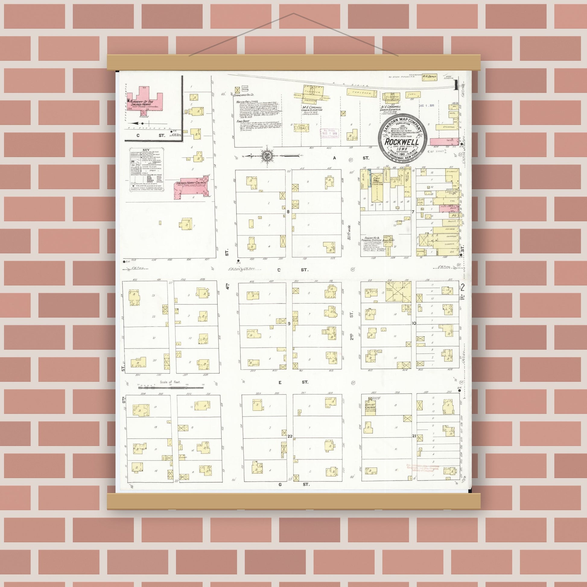 Old map wall art mockup — magnetic wood frame on brick wall — Sanborn Fire Insurance Map from Rockwell, Cerro Gordo County, Iowa (1911), Sheet #0001