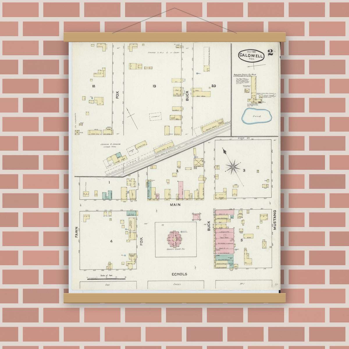 Old map wall art mockup — magnetic wood frame on brick wall — Sanborn Fire Insurance Map from Caldwell, Burleson County, Texas (1891), Sheet #0002
