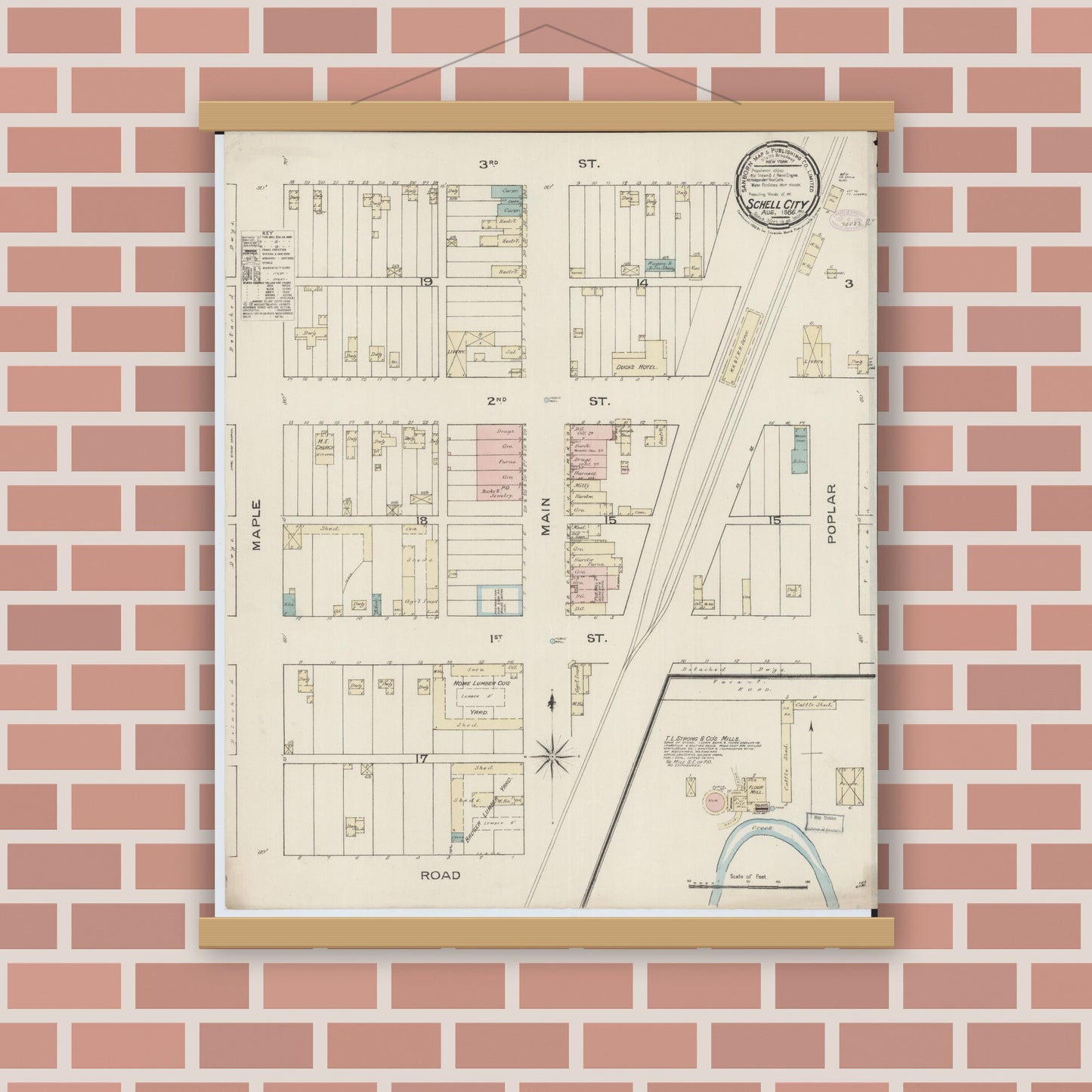 Old map wall art mockup — magnetic wood frame on brick wall — Sanborn Fire Insurance Map from Schell City, Vernon County, Missouri (1886), Sheet #0001
