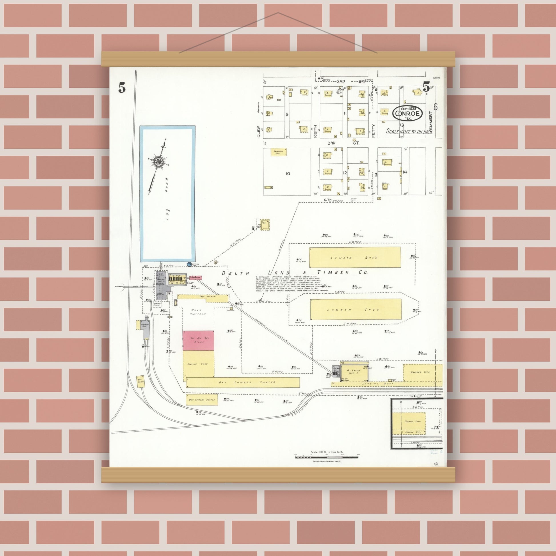 Old map wall art mockup — magnetic wood frame on brick wall — Sanborn Fire Insurance Map from Conroe, Montgomery County, Texas (1923), Sheet #0005