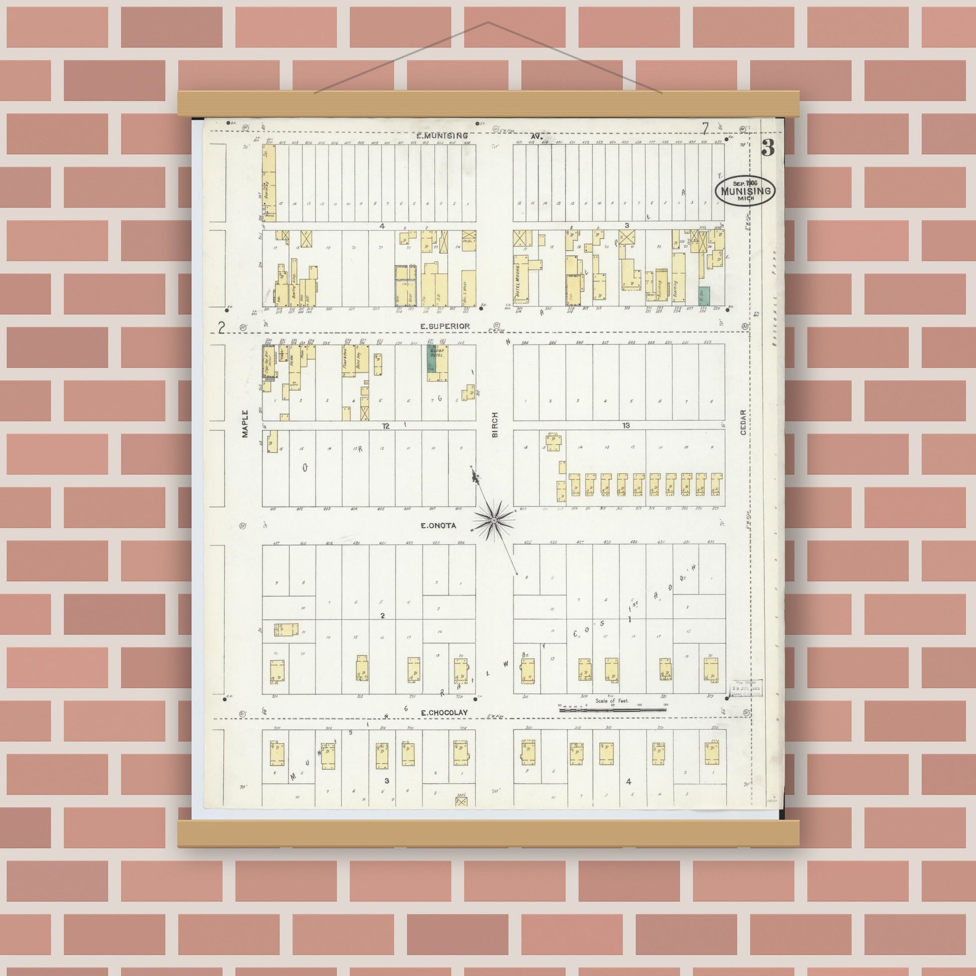 Old map wall art mockup — magnetic wood frame on brick wall — Sanborn Fire Insurance Map from Munising, Alger County, Michigan (1906), Sheet #0003