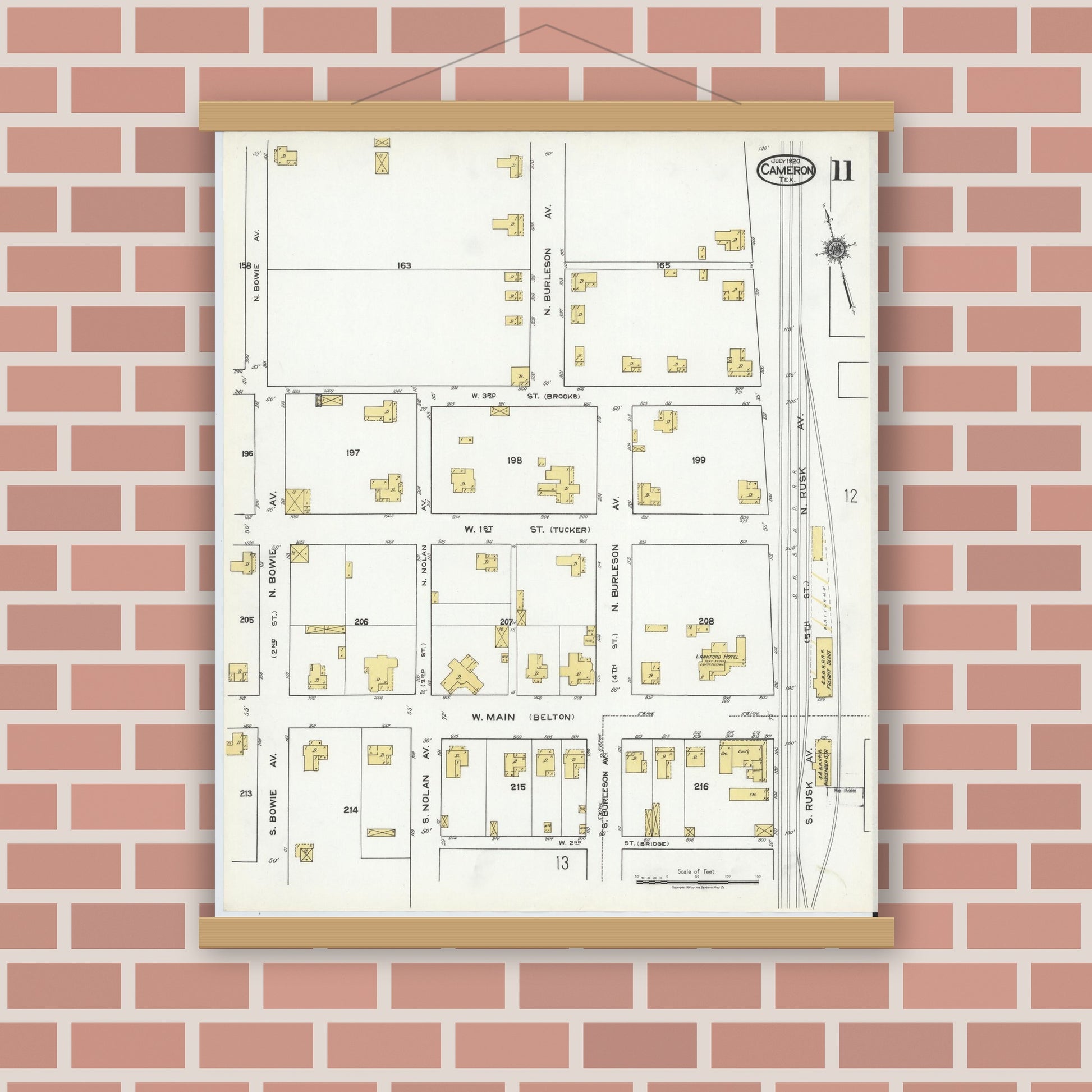 Old map wall art mockup — magnetic wood frame on brick wall — Sanborn Fire Insurance Map from Cameron, Milam County, Texas (1920), Sheet #0011