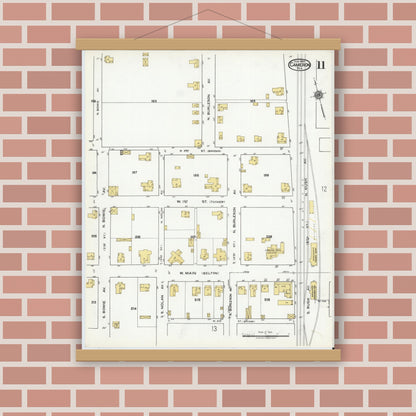 Old map wall art mockup — magnetic wood frame on brick wall — Sanborn Fire Insurance Map from Cameron, Milam County, Texas (1920), Sheet #0011