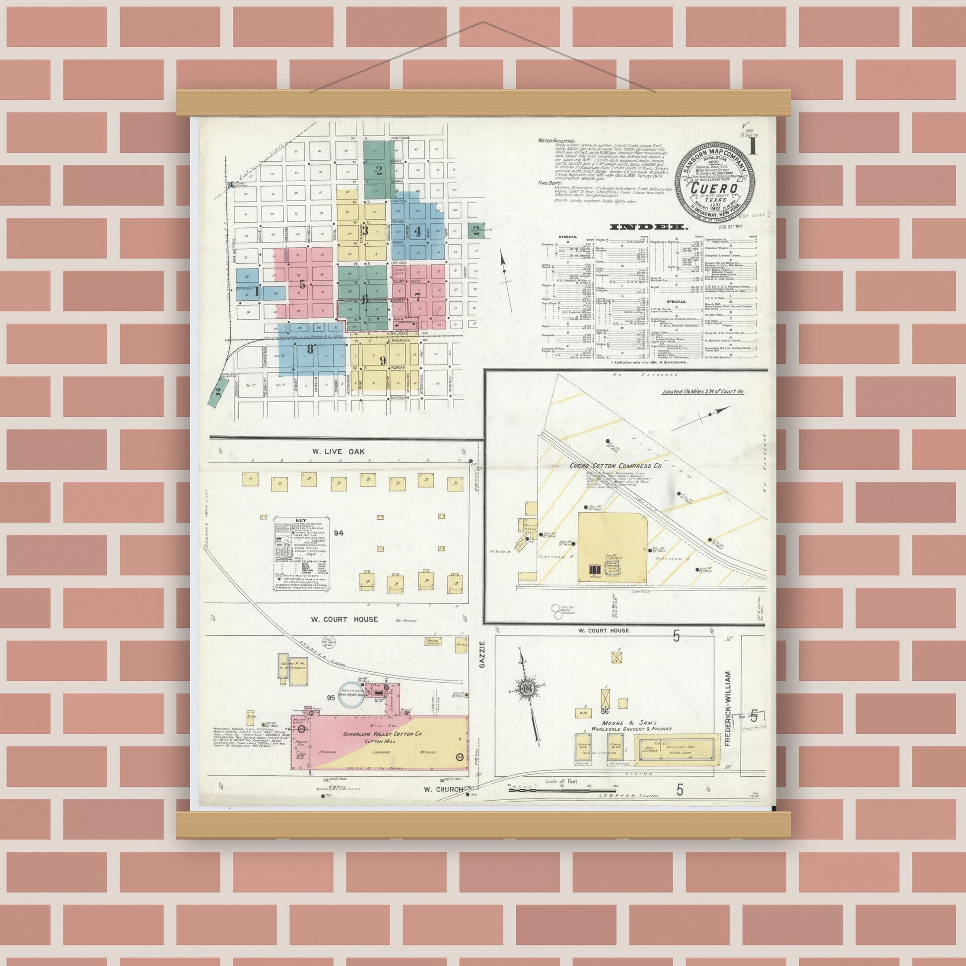 Old map wall art mockup — magnetic wood frame on brick wall — Sanborn Fire Insurance Map from Cuero, De Witt County, Texas (1912), Sheet #0001
