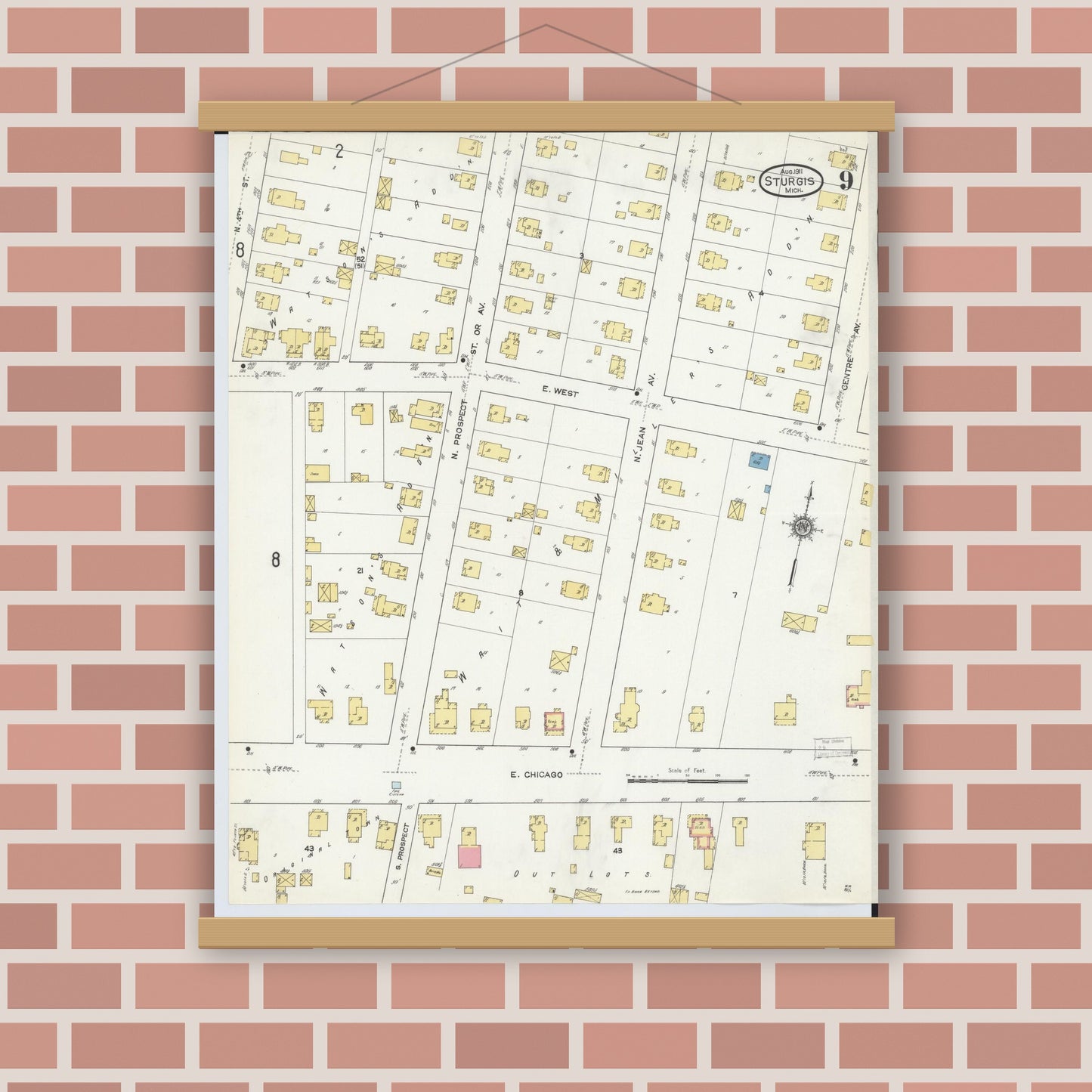Old map wall art mockup — magnetic wood frame on brick wall — Sanborn Fire Insurance Map from Sturgis, Saint Joseph County, Michigan (1911), Sheet #0009