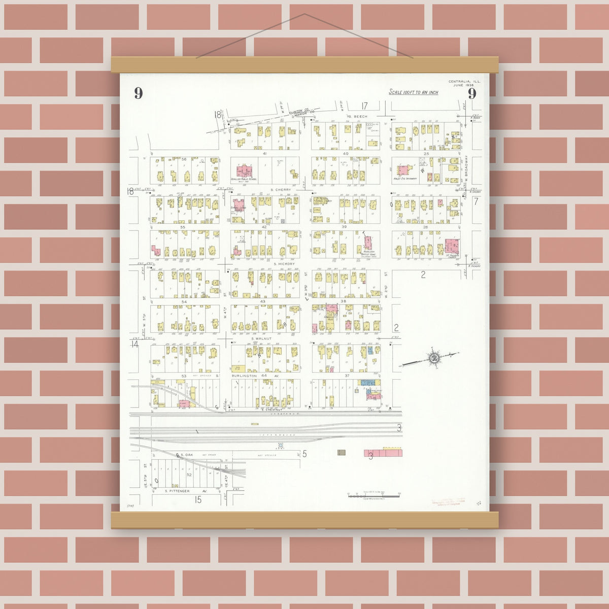 Old map wall art mockup — magnetic wood frame on brick wall — Sanborn Fire Insurance Map from Centralia, Marion, Clinton, Jefferson, and Washington Counties, Illinois (1938), Sheet #0009