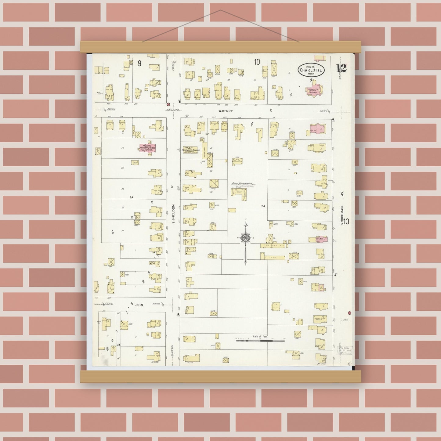 Old map wall art mockup — magnetic wood frame on brick wall — Sanborn Fire Insurance Map from Charlotte, Eaton County, Michigan (1911), Sheet #0012