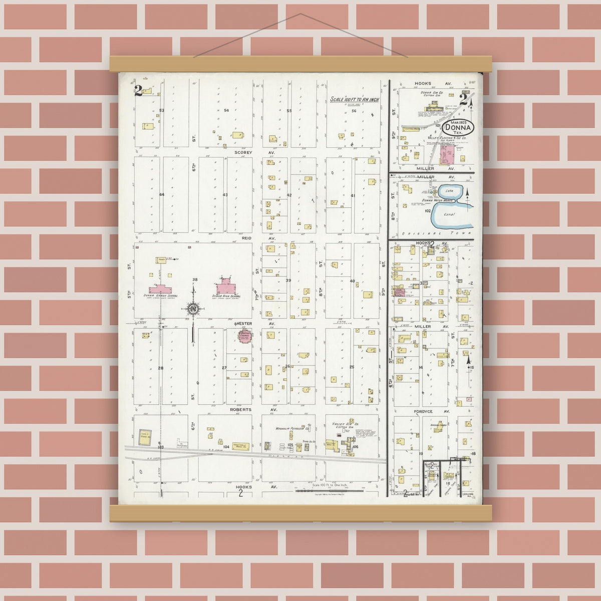 Old map wall art mockup — magnetic wood frame on brick wall — Sanborn Fire Insurance Map from Donna, Hidalgo County, Texas (1925), Sheet #0002