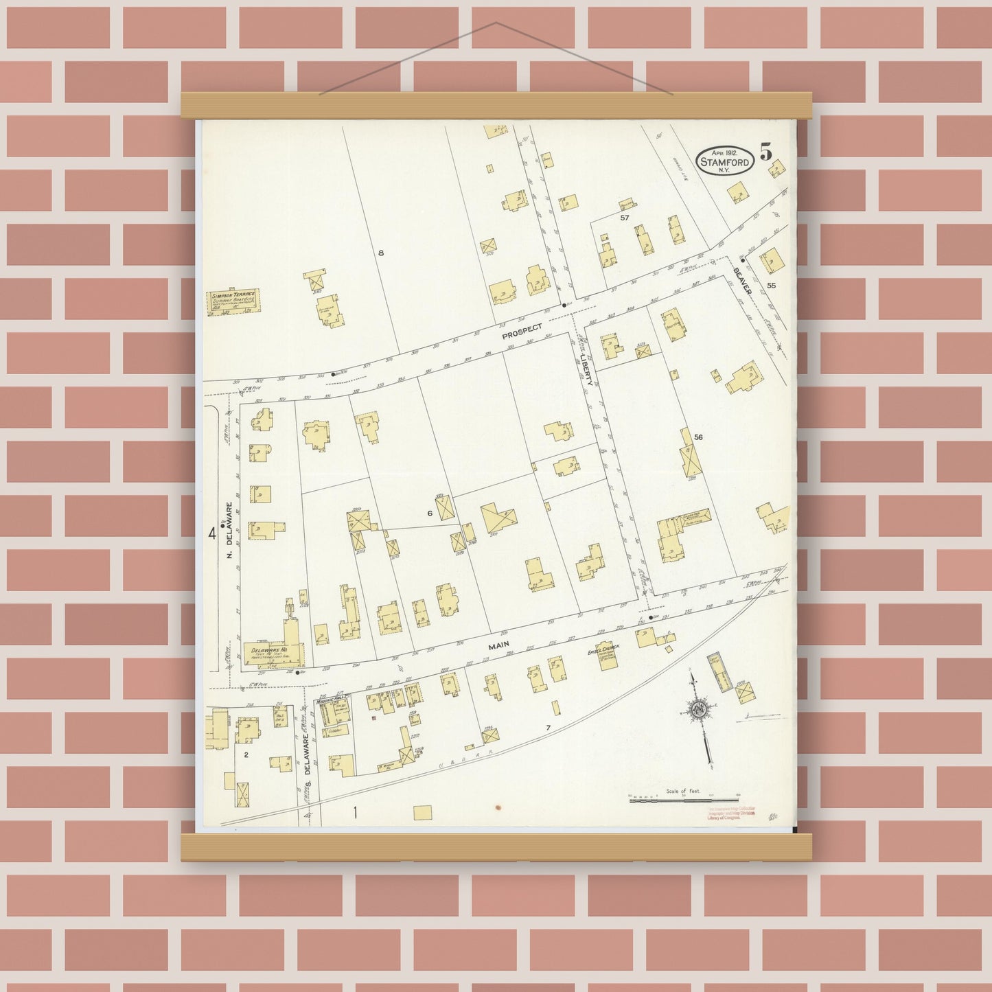 Old map wall art mockup — magnetic wood frame on brick wall — Sanborn Fire Insurance Map from Stamford, Delaware County, New York (1912), Sheet #0005