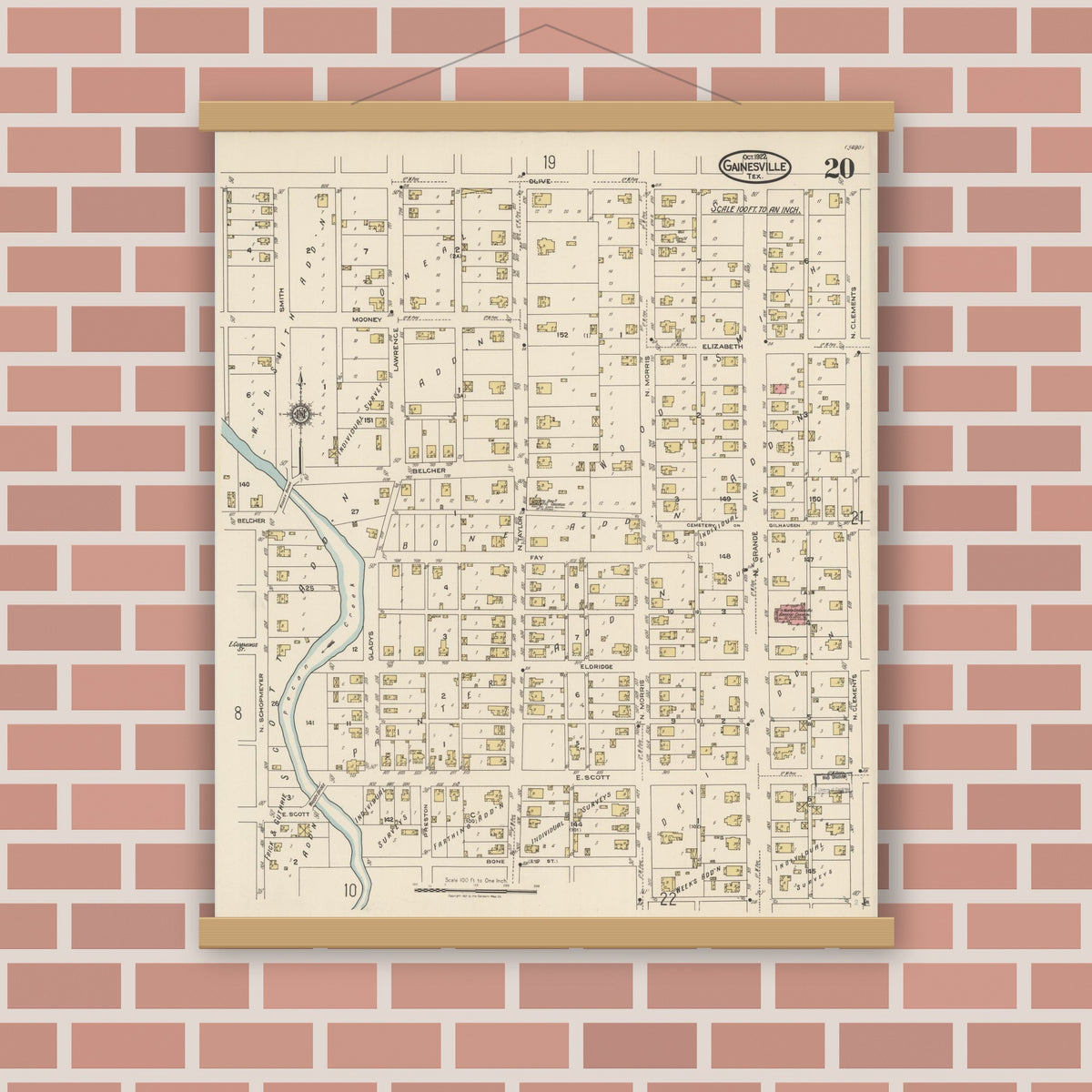 Old map wall art mockup — magnetic wood frame on brick wall — Sanborn Fire Insurance Map from Gainesville, Cooke County, Texas (1922), Sheet #0020