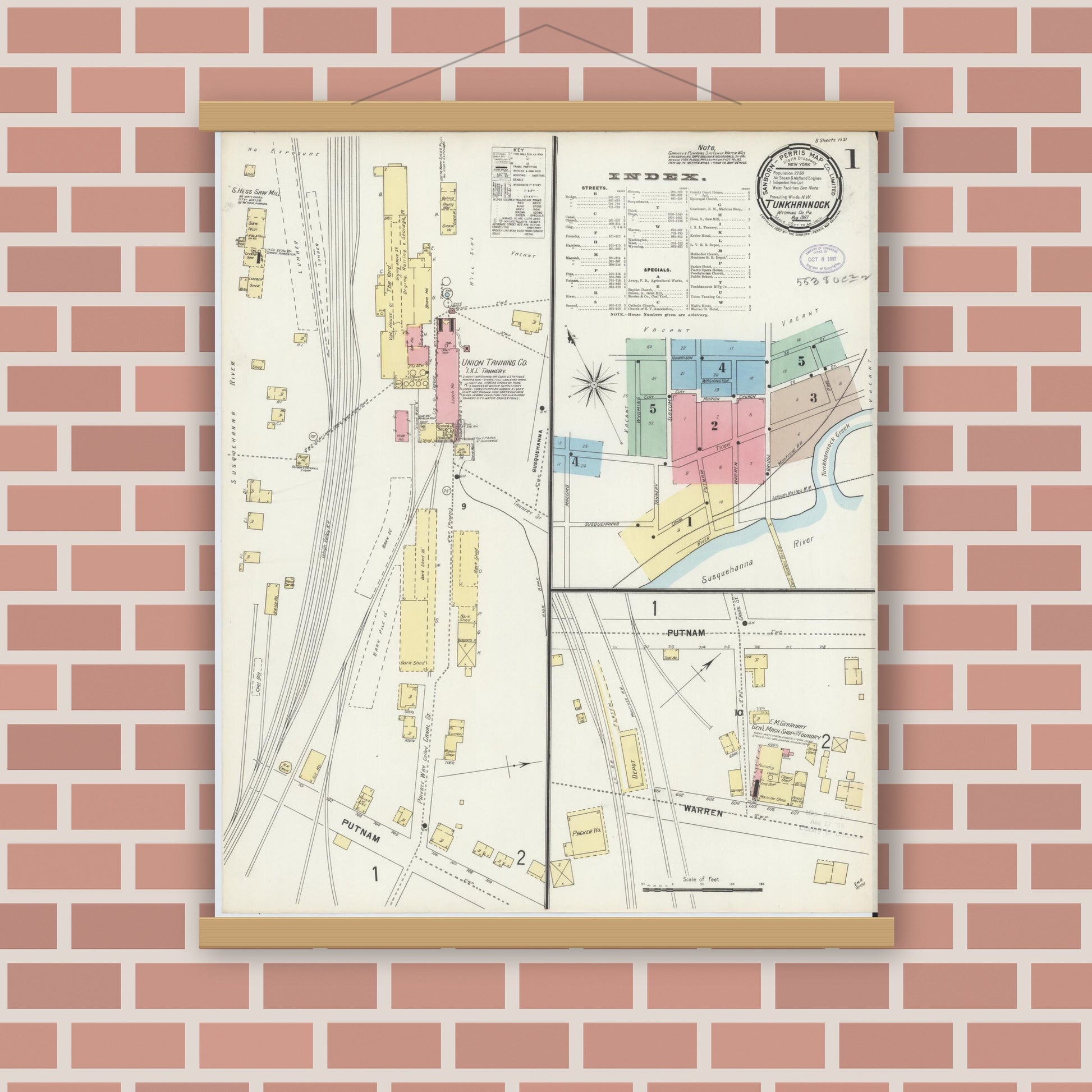 Old map wall art mockup — magnetic wood frame on brick wall — Sanborn Fire Insurance Map from Tunkhannock, Wyoming County, Pennsylvania (1897), Sheet #0001