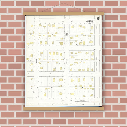 Old map wall art mockup — magnetic wood frame on brick wall — Sanborn Fire Insurance Map from Ackley, Hardin and Franklin Counties, Iowa (1916), Sheet #0006
