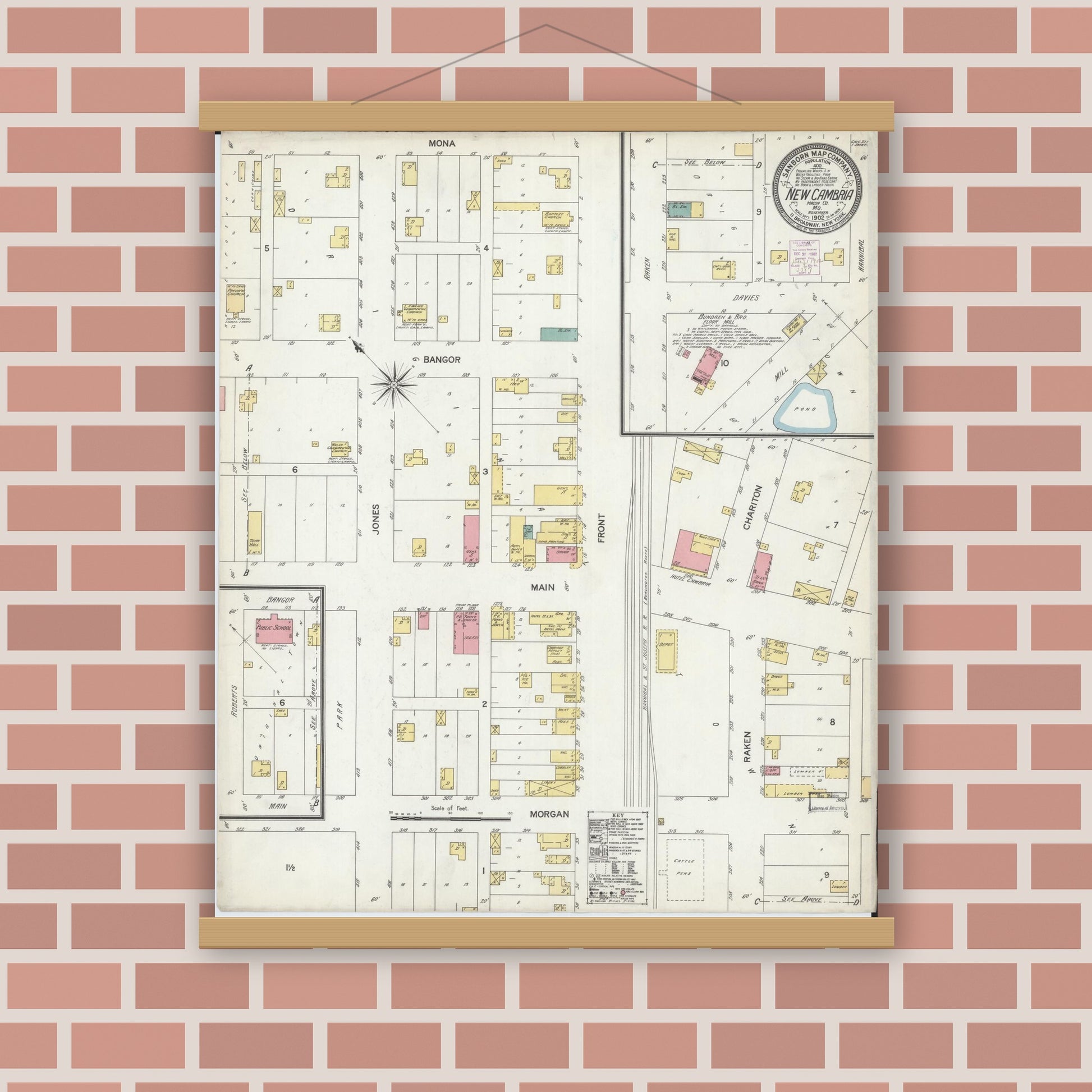 Old map wall art mockup — magnetic wood frame on brick wall — Sanborn Fire Insurance Map from New Cambria, Macon County, Missouri (1892), Sheet #0001