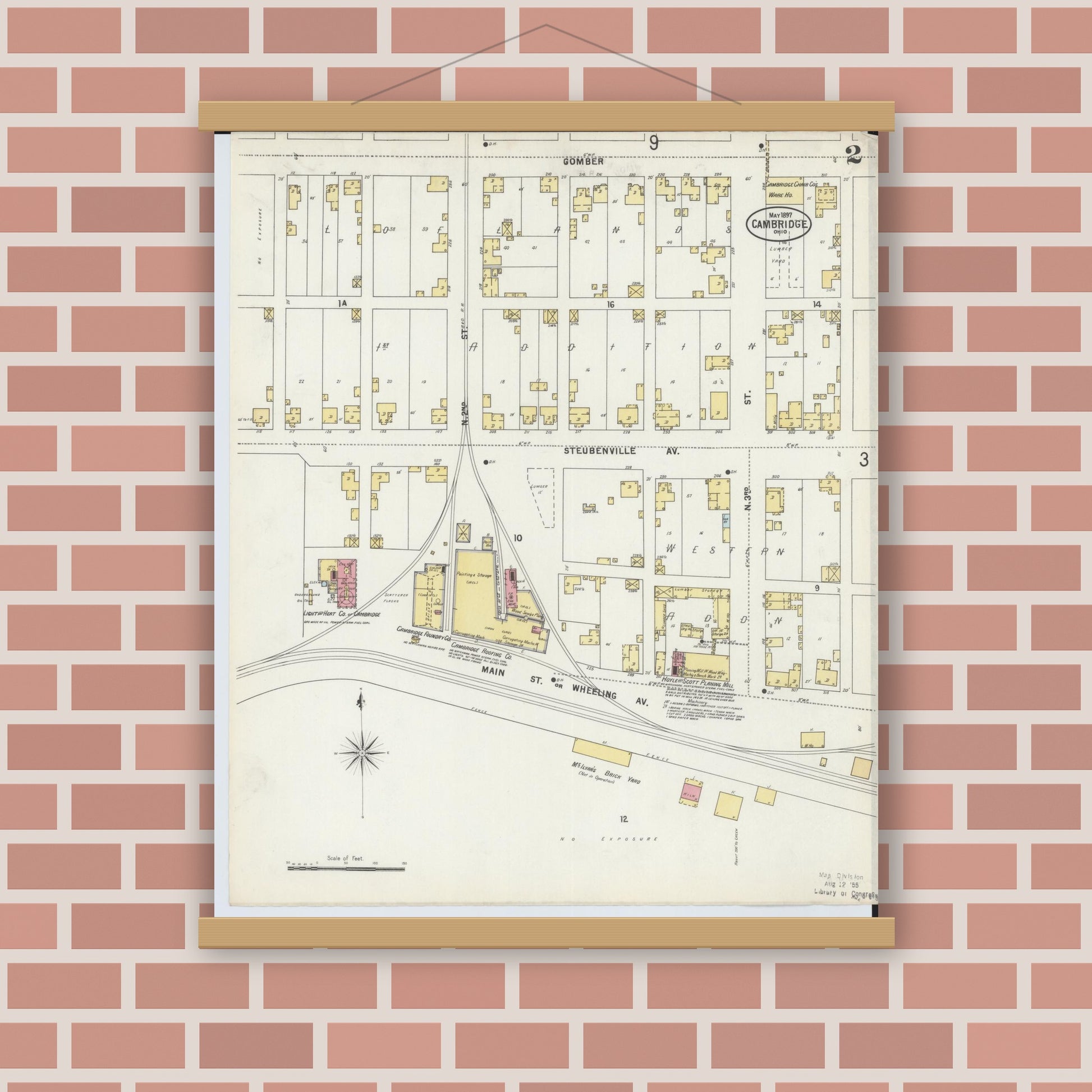 Old map wall art mockup — magnetic wood frame on brick wall — Sanborn Fire Insurance Map from Cambridge, Guernsey County, Ohio (1897), Sheet #0002