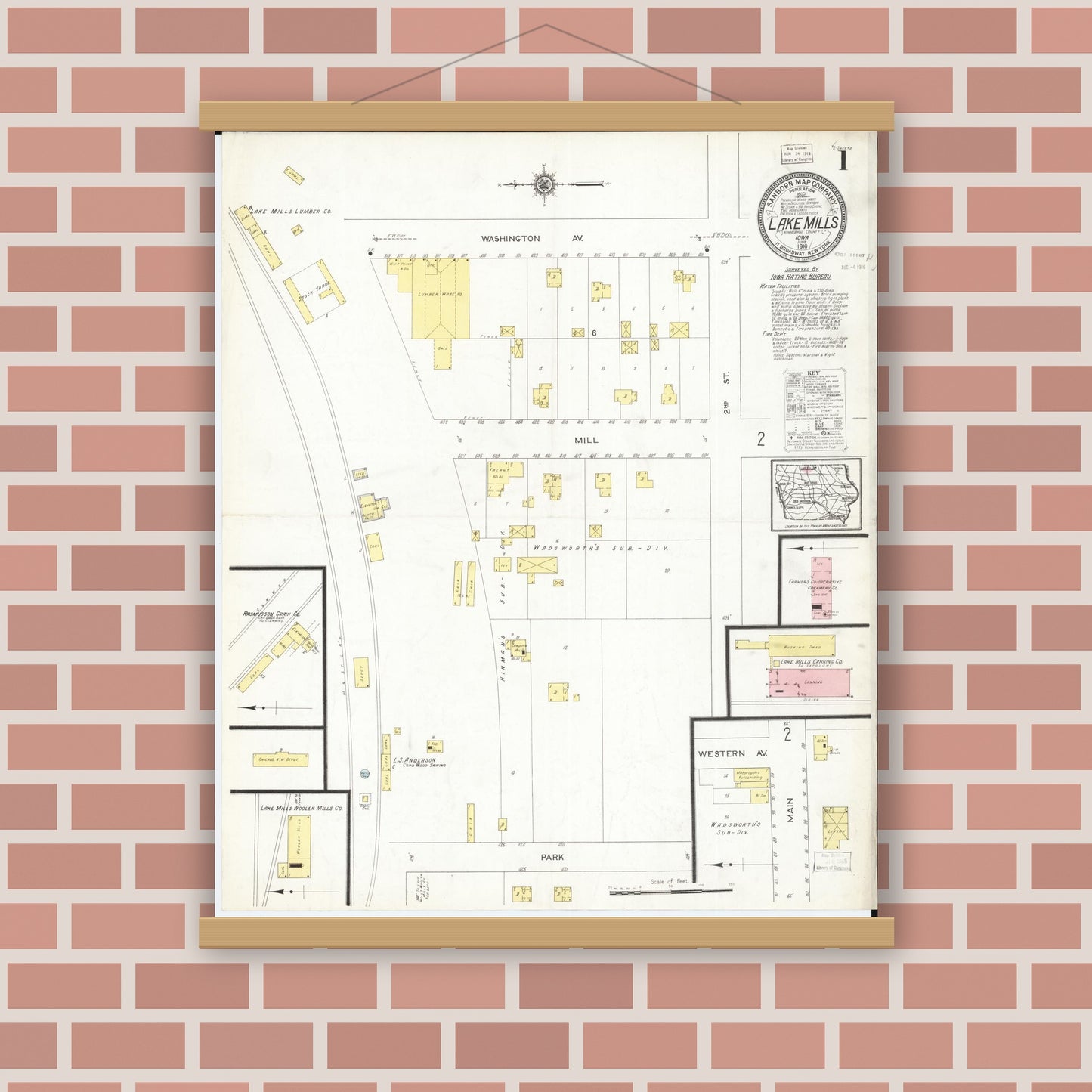 Old map wall art mockup — magnetic wood frame on brick wall — Sanborn Fire Insurance Map from Lake Mills, Winnebago County, Iowa (1916) â€” Complete Set
