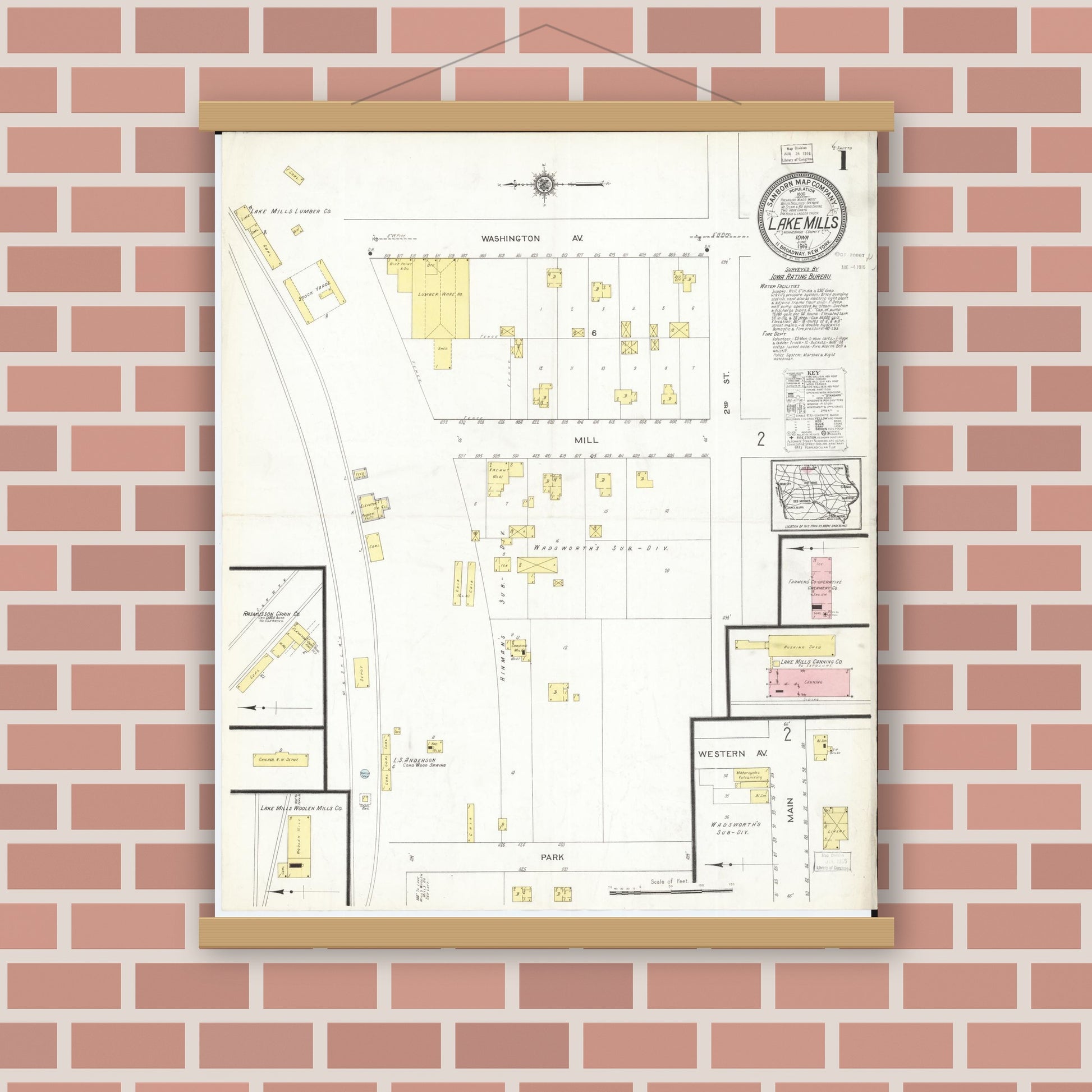 Old map wall art mockup — magnetic wood frame on brick wall — Sanborn Fire Insurance Map from Lake Mills, Winnebago County, Iowa (1916) â€” Complete Set