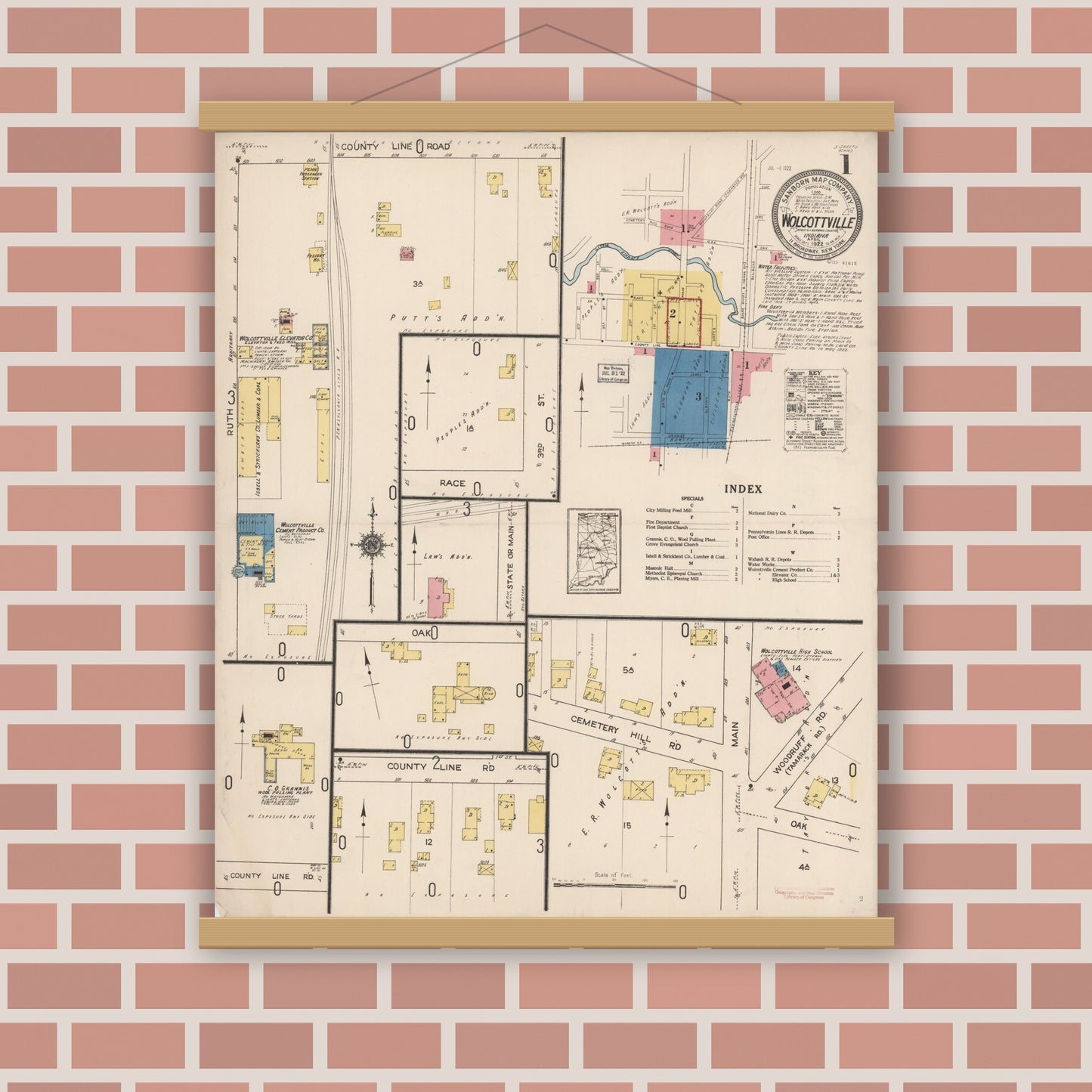 Old map wall art mockup — magnetic wood frame on brick wall — Sanborn Fire Insurance Map from Wolcottville, Noble And LaGrange Counties, Indiana (1922), Sheet #0001