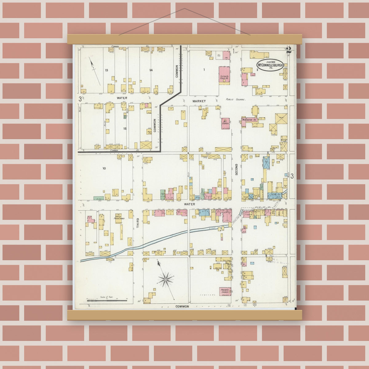 Old map wall art mockup — magnetic wood frame on brick wall — Sanborn Fire Insurance Map from McConnellsburgh, Fulton County, Pennsylvania (1899), Sheet #0002