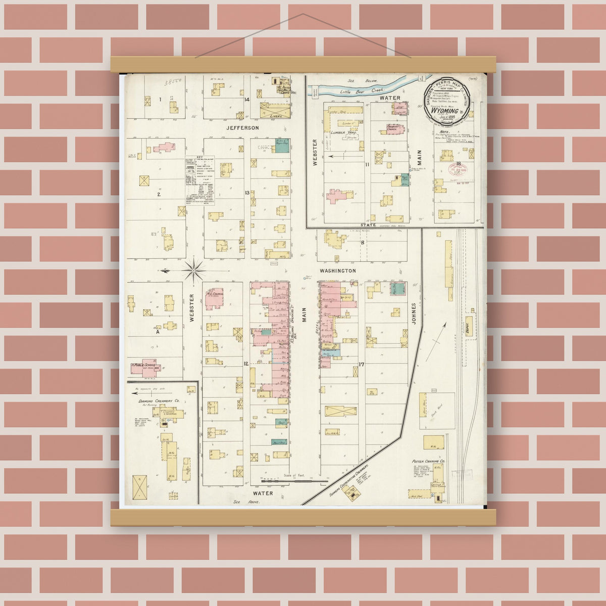 Old map wall art mockup — magnetic wood frame on brick wall — Sanborn Fire Insurance Map from Wyoming, Jones County, Iowa (1895), Sheet #0001