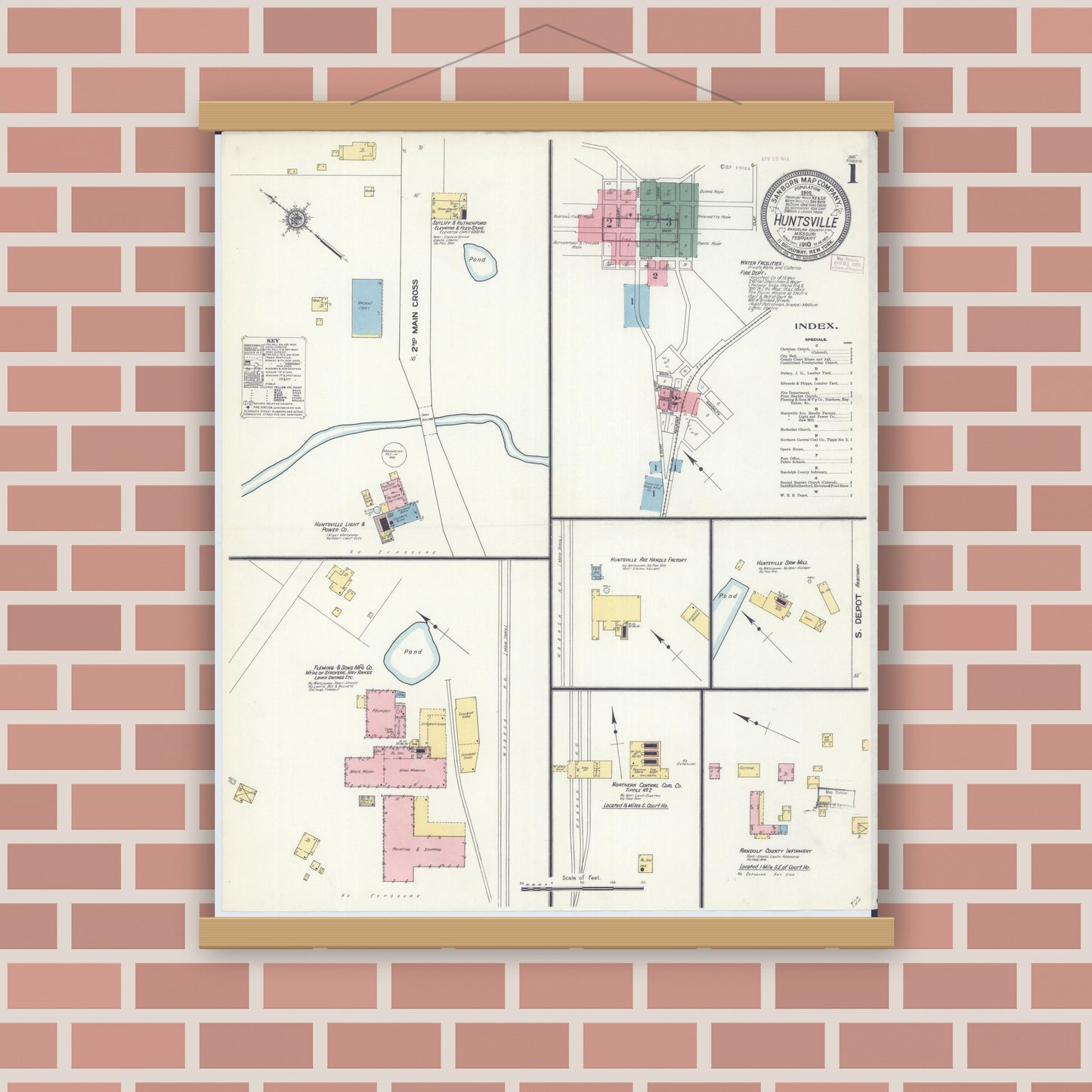 Old map wall art mockup — magnetic wood frame on brick wall — Sanborn Fire Insurance Map from Huntsville, Randolph County, Missouri (1910), Sheet #0001