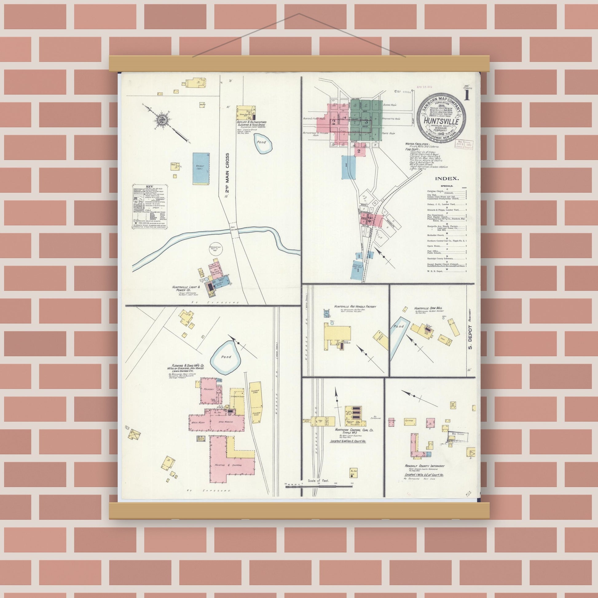 Old map wall art mockup — magnetic wood frame on brick wall — Sanborn Fire Insurance Map from Huntsville, Randolph County, Missouri (1910), Sheet #0001