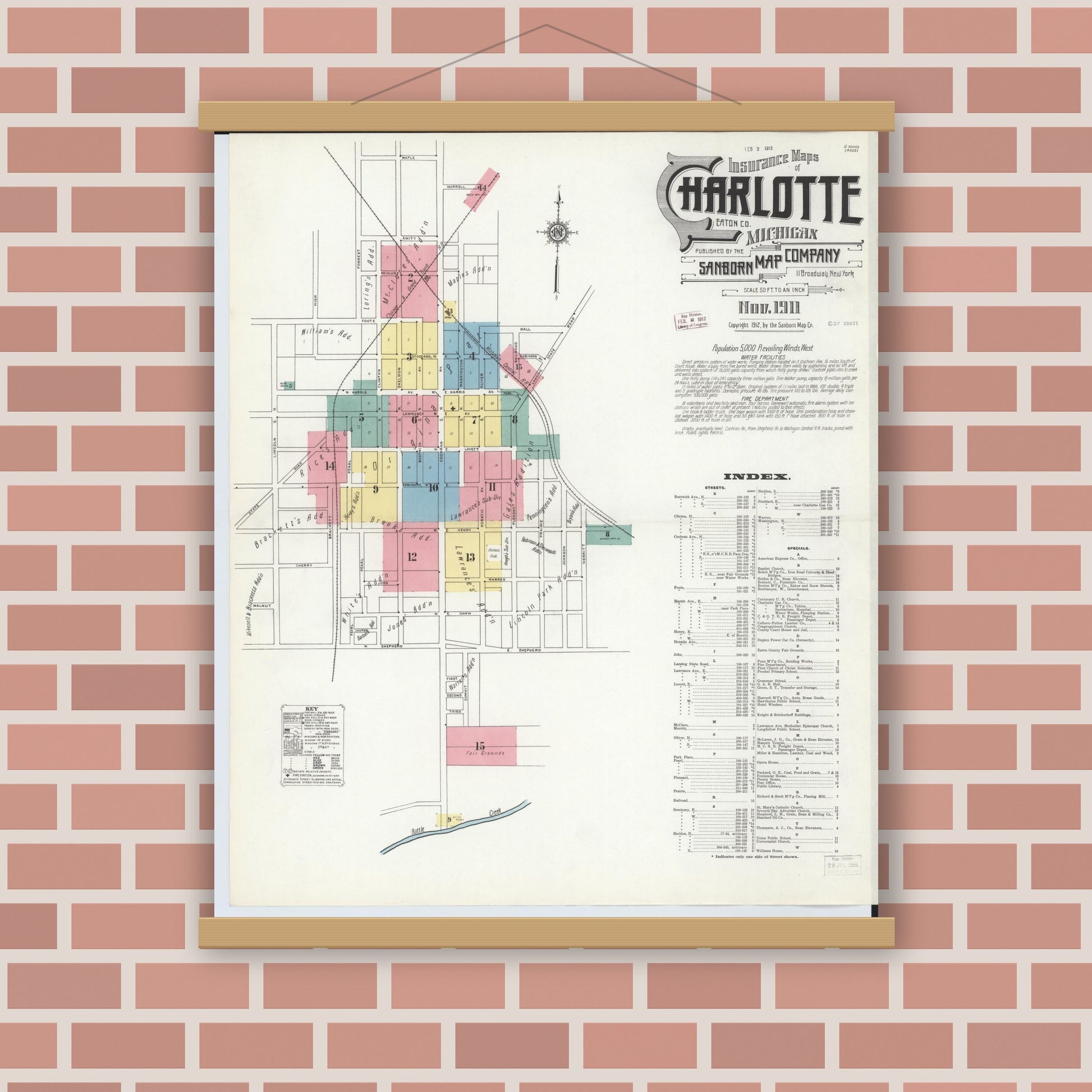 Old map wall art mockup — magnetic wood frame on brick wall — Sanborn Fire Insurance Map from Charlotte, Eaton County, Michigan (1911), Sheet #0001