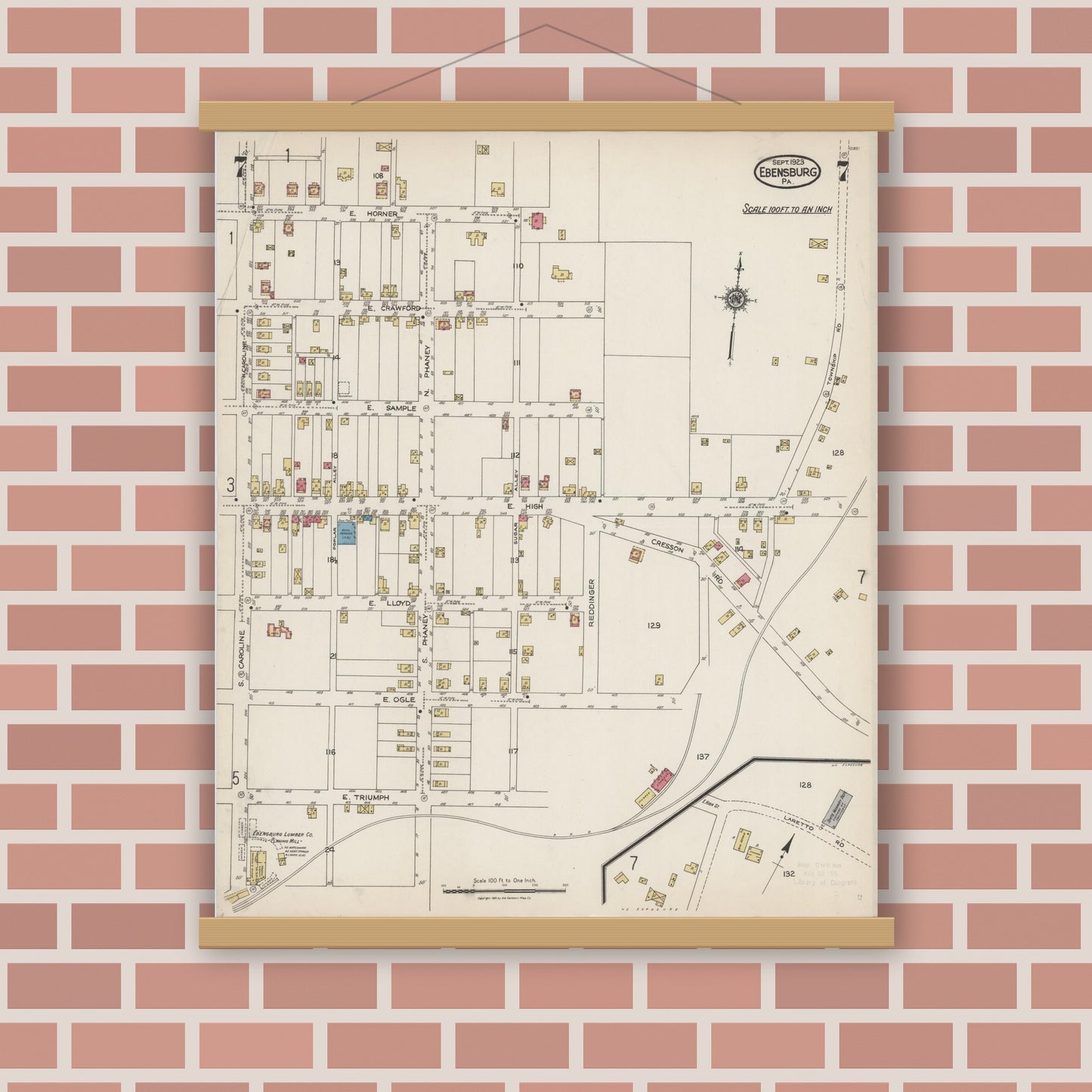 Old map wall art mockup — magnetic wood frame on brick wall — Sanborn Fire Insurance Map from Ebensburg, Cambria County, Pennsylvania (1923), Sheet #0007