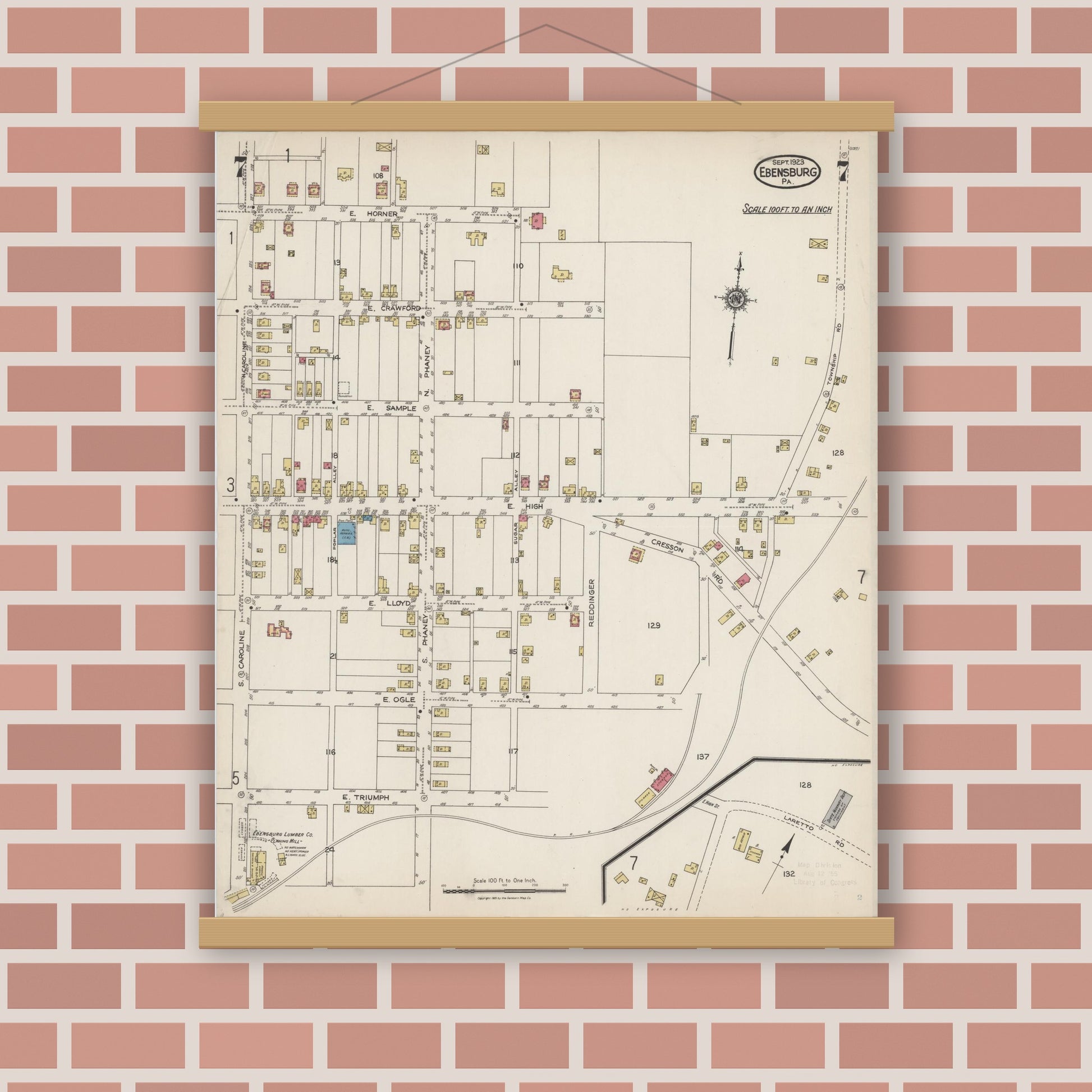 Old map wall art mockup — magnetic wood frame on brick wall — Sanborn Fire Insurance Map from Ebensburg, Cambria County, Pennsylvania (1923), Sheet #0007