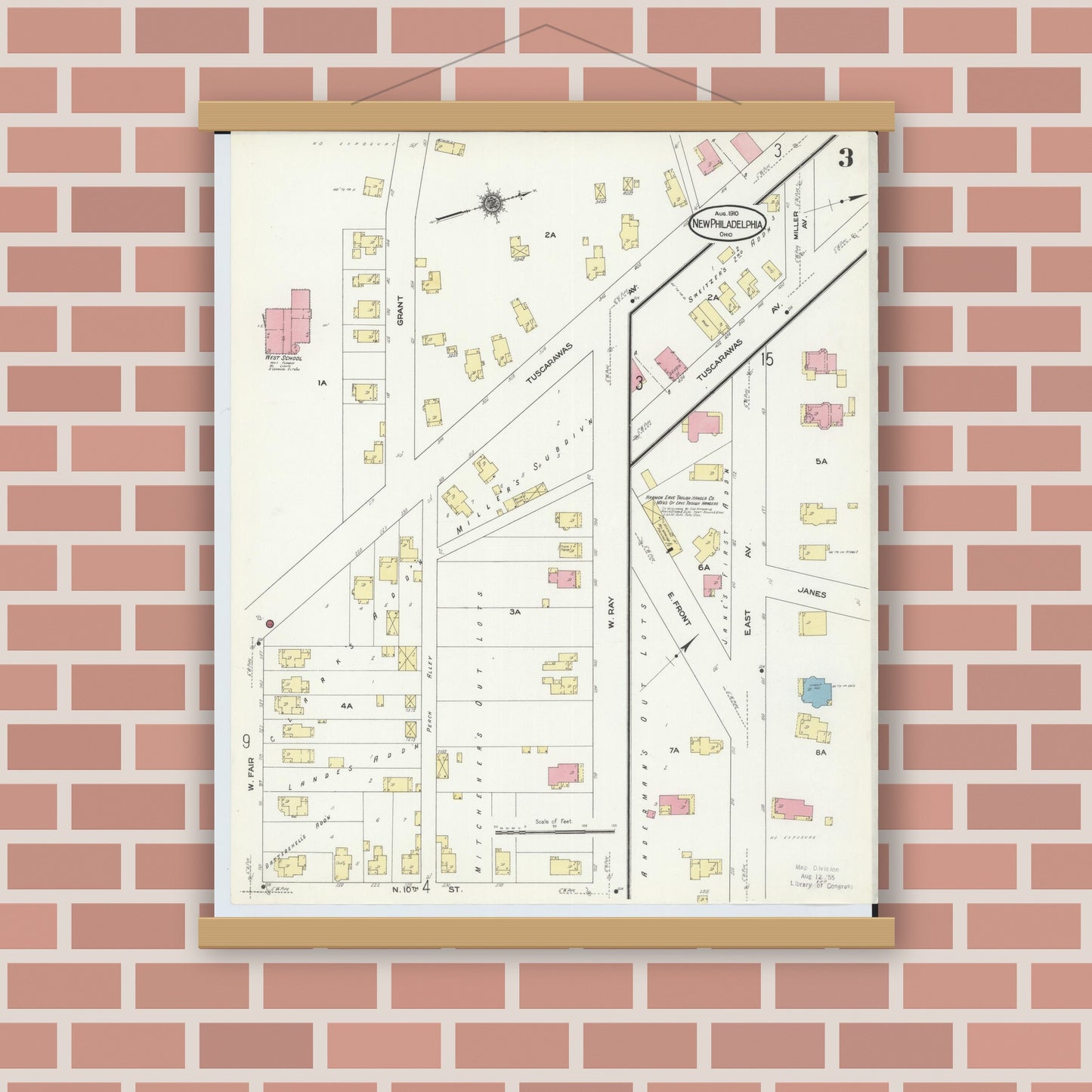 Old map wall art mockup — magnetic wood frame on brick wall — Sanborn Fire Insurance Map from New Philadelphia, Tuscarawas County, Ohio (1910), Sheet #0003