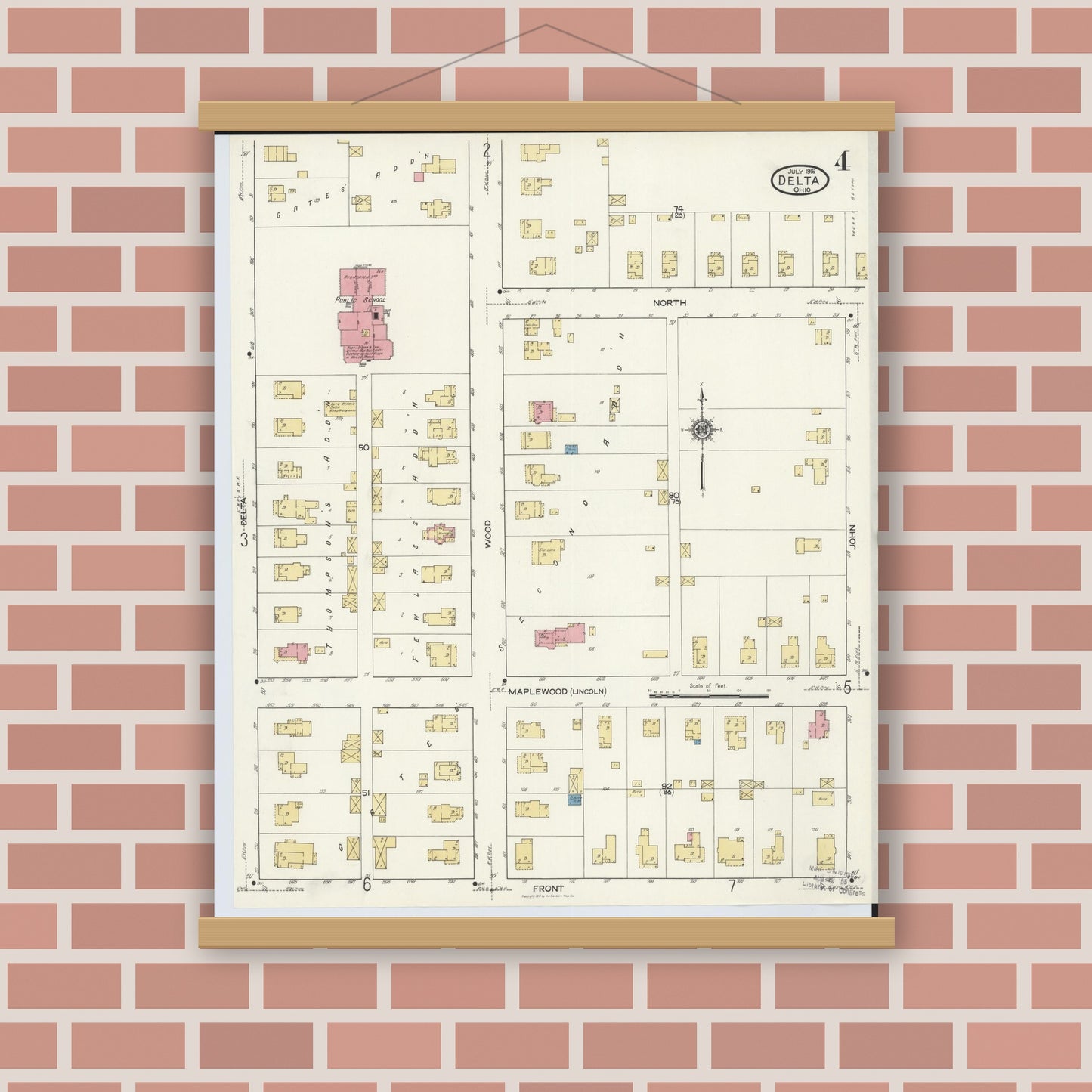 Old map wall art mockup — magnetic wood frame on brick wall — Sanborn Fire Insurance Map from Delta, Fulton County, Ohio (1916), Sheet #0004