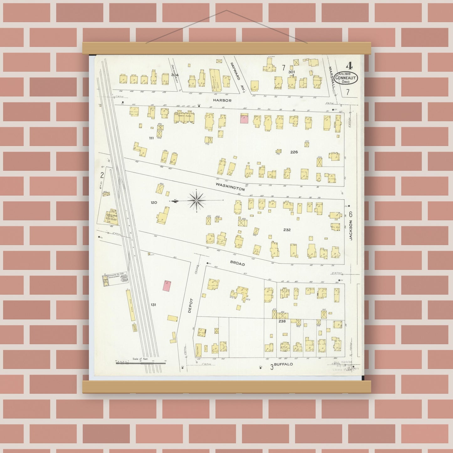 Old map wall art mockup — magnetic wood frame on brick wall — Sanborn Fire Insurance Map from Conneaut, Ashtabula County, Ohio (1909), Sheet #0004