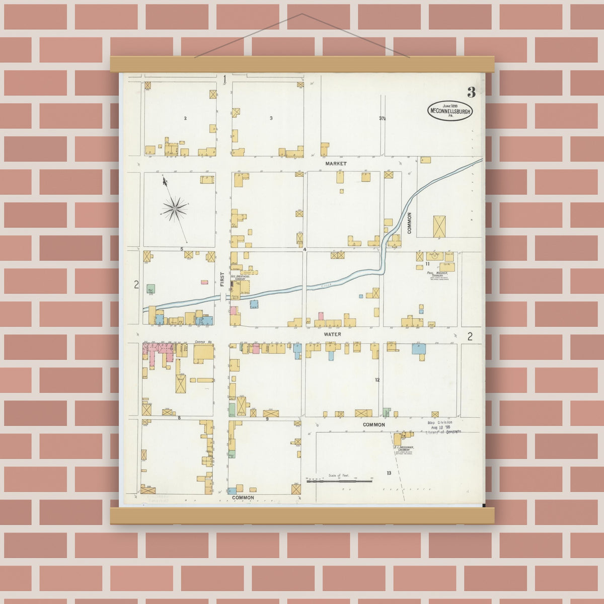 Old map wall art mockup — magnetic wood frame on brick wall — Sanborn Fire Insurance Map from McConnellsburgh, Fulton County, Pennsylvania (1899), Sheet #0003