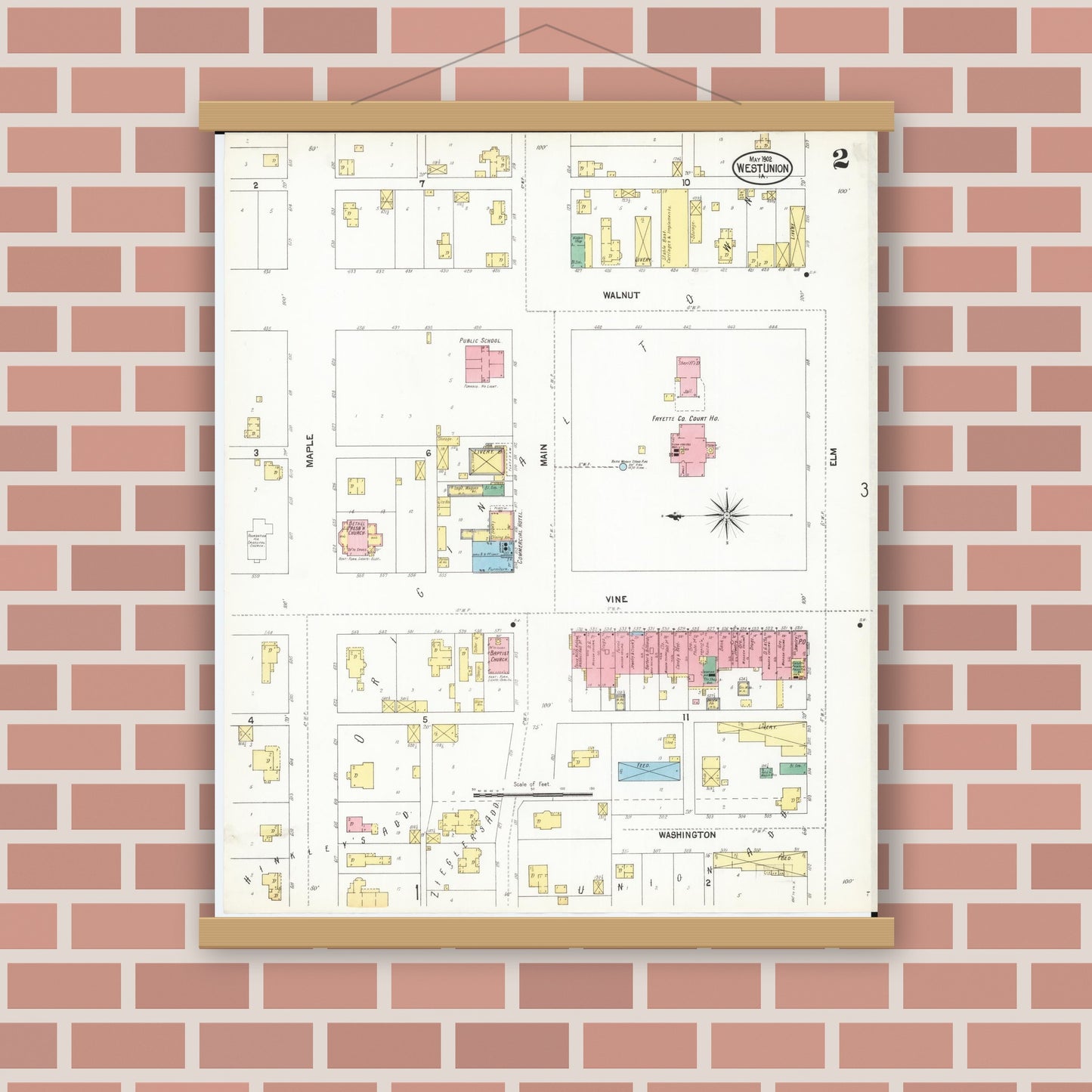 Old map wall art mockup — magnetic wood frame on brick wall — Sanborn Fire Insurance Map from West Union, Fayette County, Iowa (1902), Sheet #0002