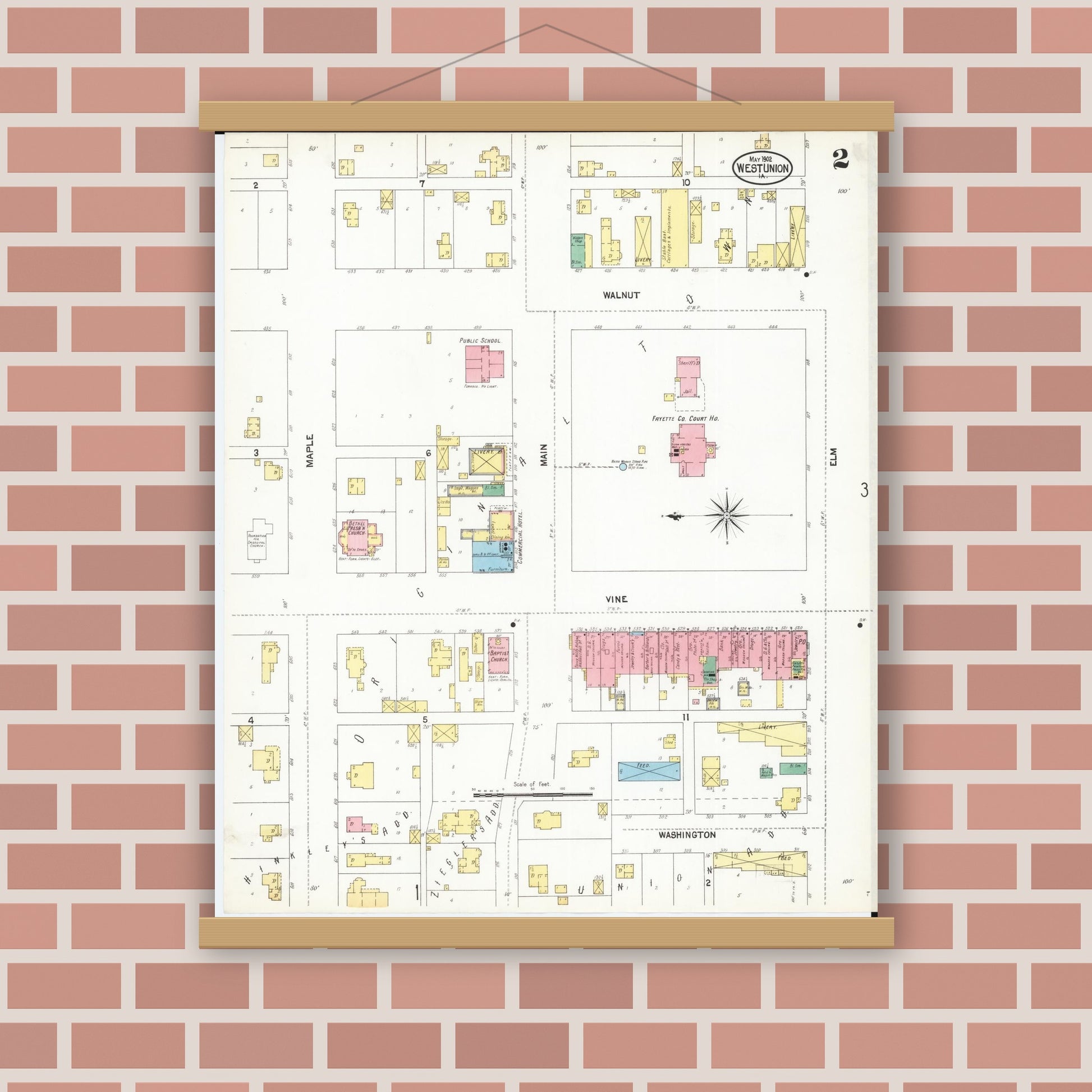Old map wall art mockup — magnetic wood frame on brick wall — Sanborn Fire Insurance Map from West Union, Fayette County, Iowa (1902), Sheet #0002