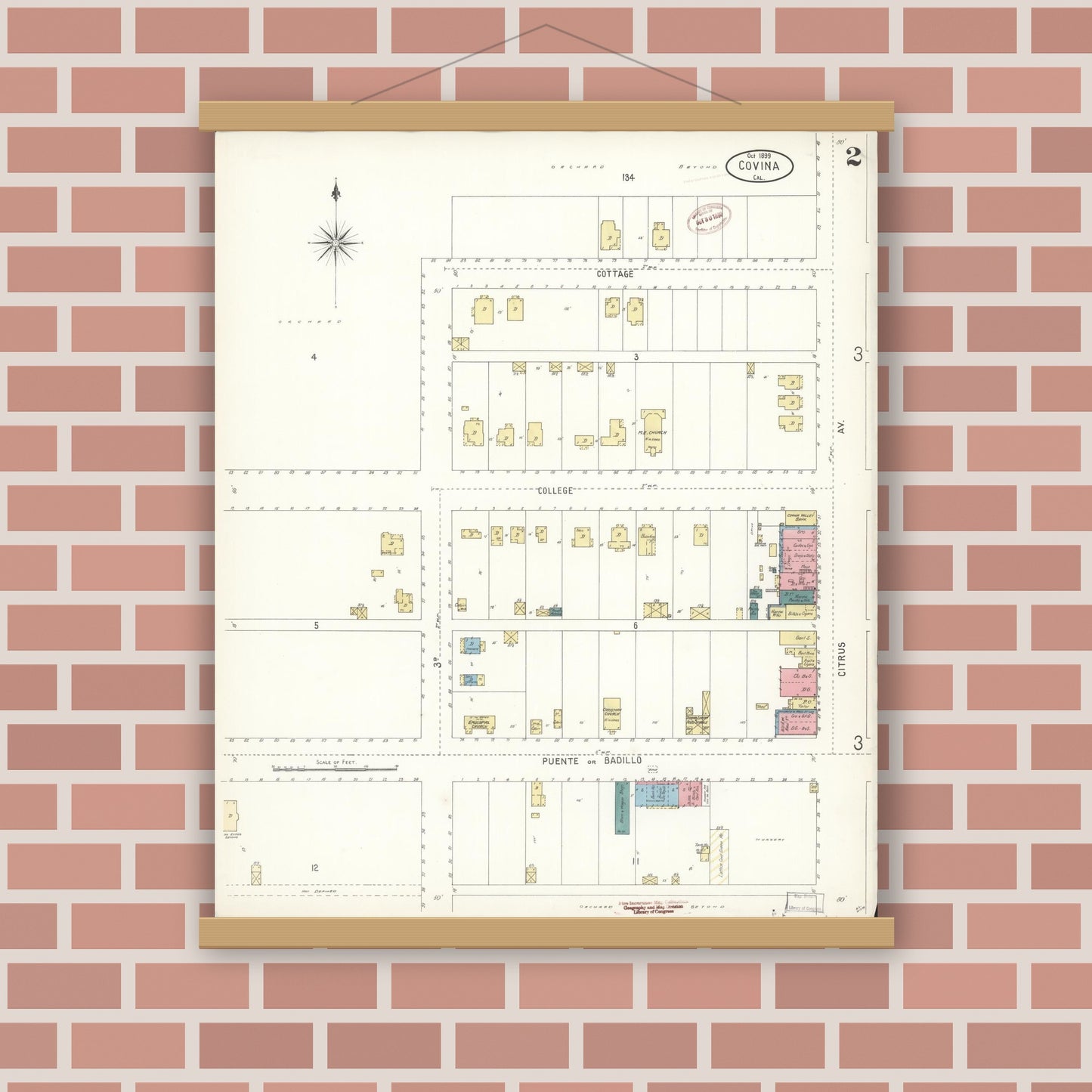 Old map wall art mockup — magnetic wood frame on brick wall — Sanborn Fire Insurance Map from Covina, Los Angeles County, California (1899), Sheet #0002