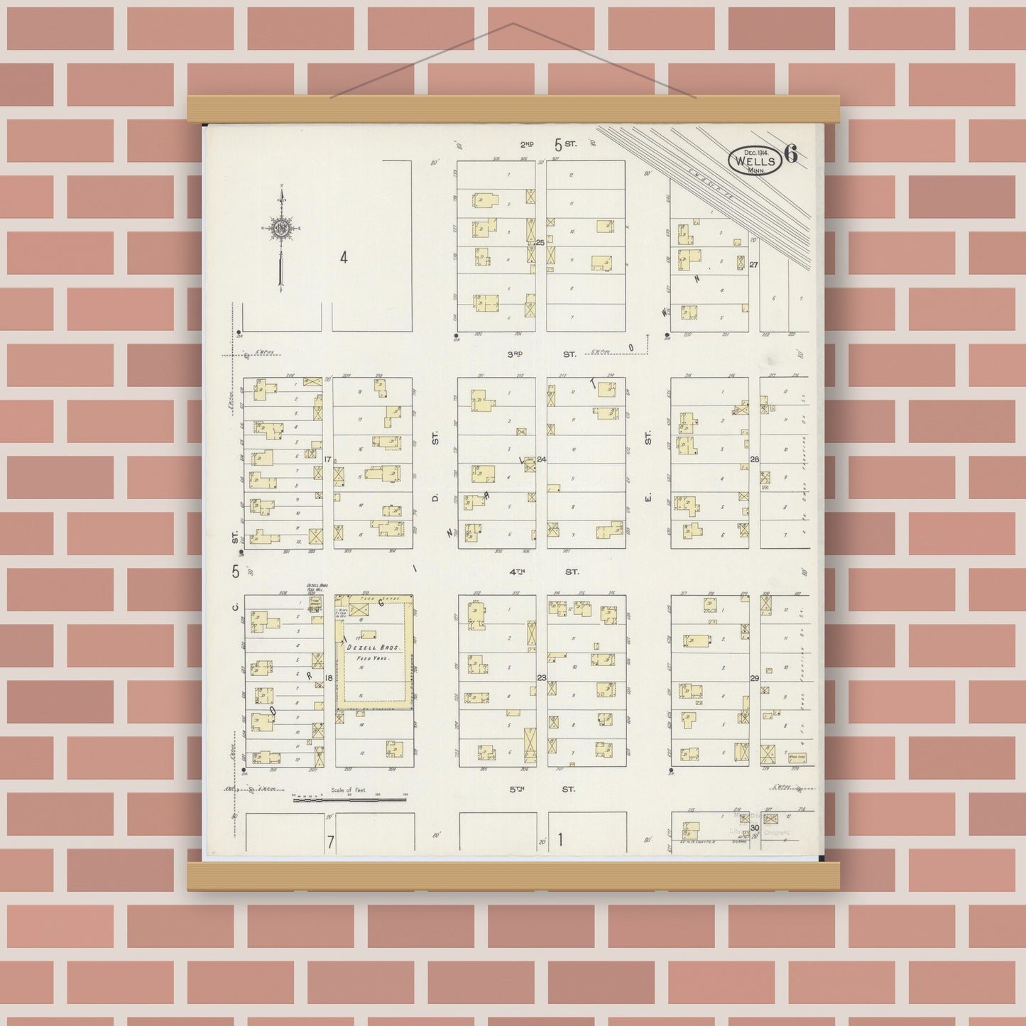 Old map wall art mockup — magnetic wood frame on brick wall — Sanborn Fire Insurance Map from Wells, Faribault County, Minnesota (1914), Sheet #0006
