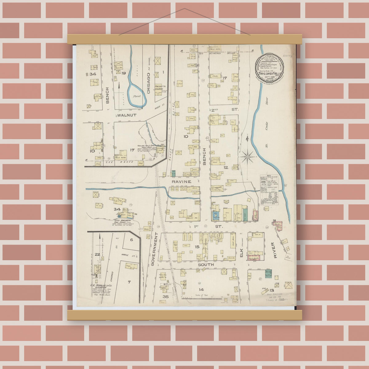 Old map wall art mockup — magnetic wood frame on brick wall — Sanborn Fire Insurance Map from Taylors Falls, Chisago County, Minnesota (1885), Sheet #0001