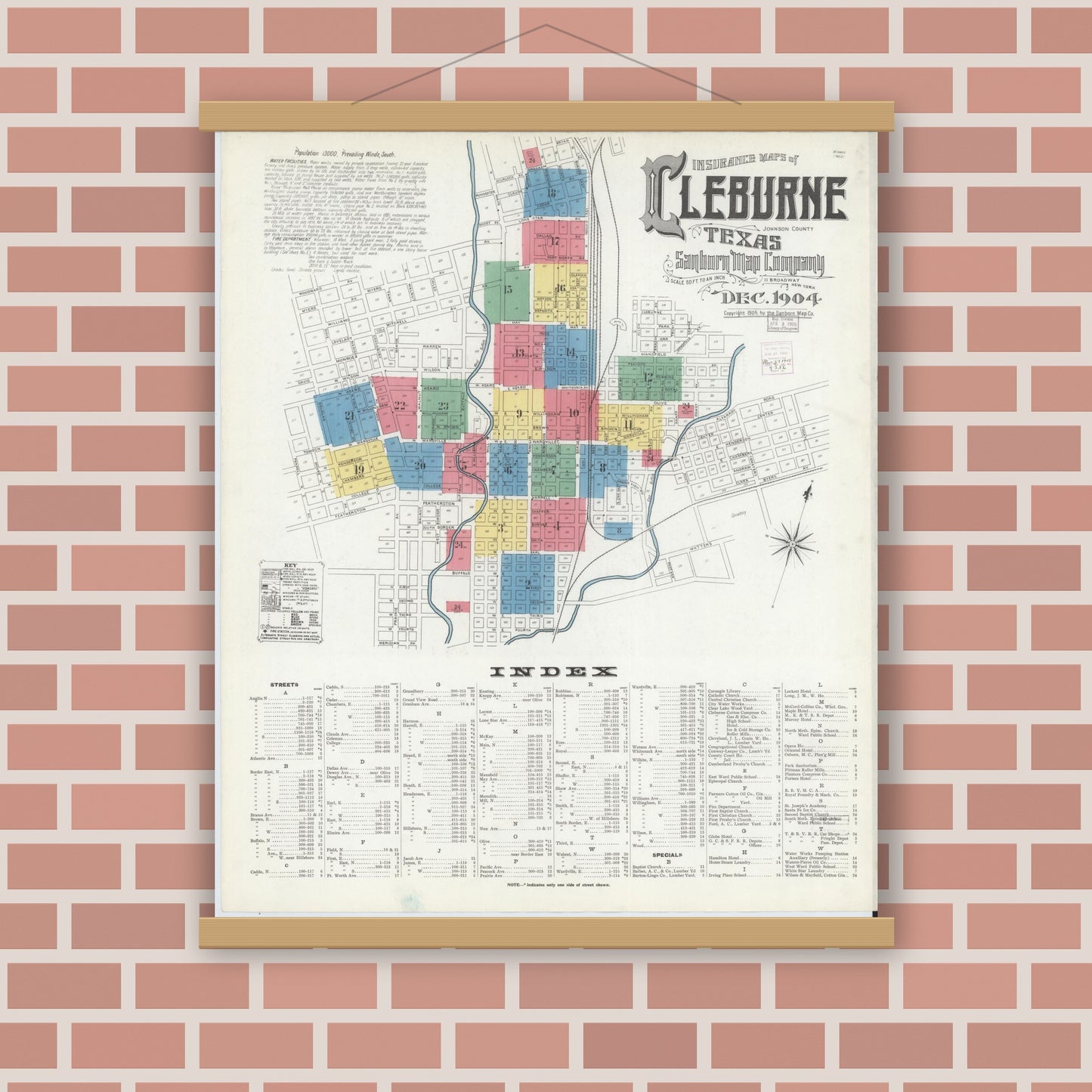 Old map wall art mockup — magnetic wood frame on brick wall — Sanborn Fire Insurance Map from Cleburne, Johnson County, Texas (1904), Sheet #0001